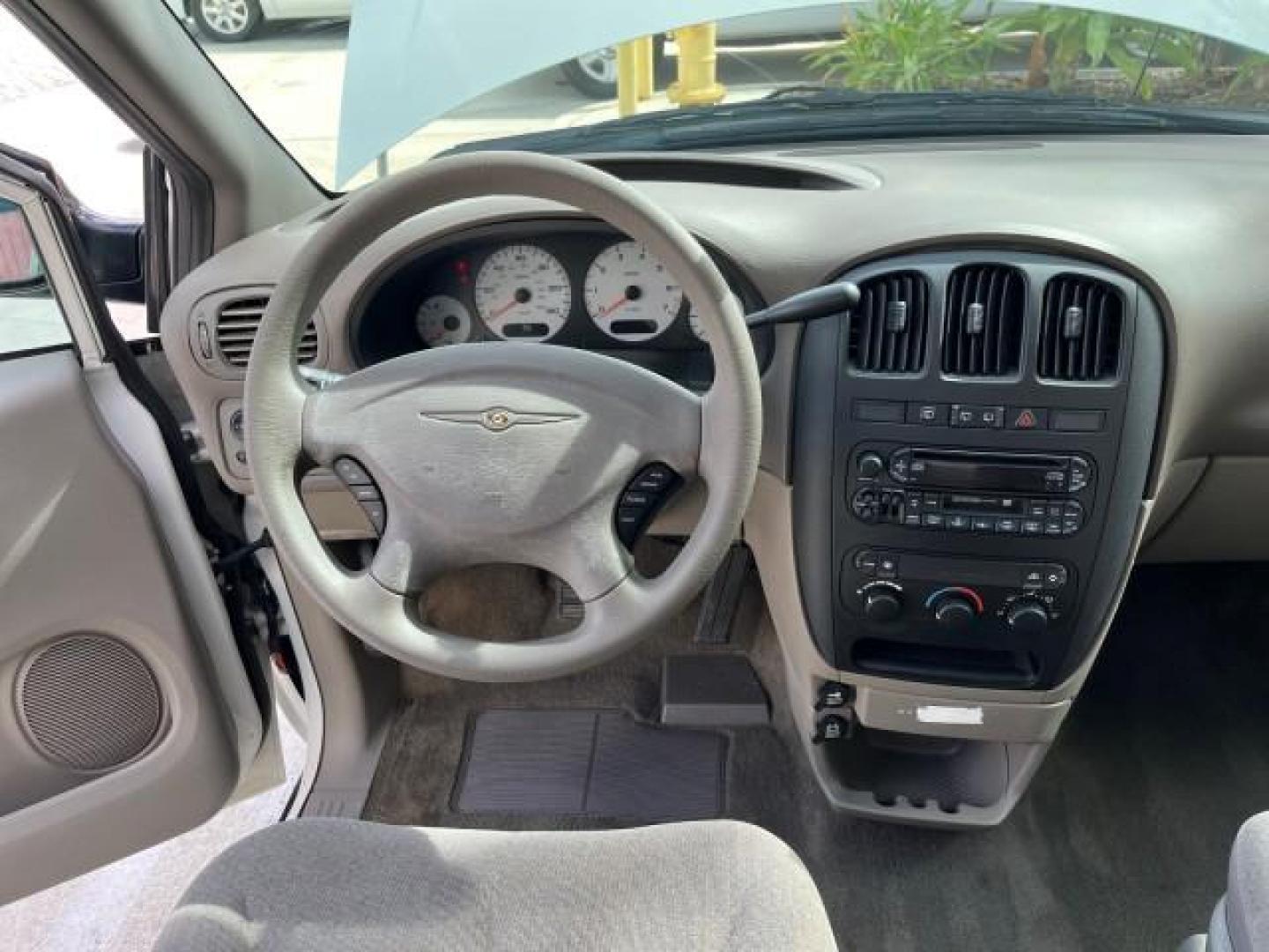 2003 Stone White /Sandstone Chrysler Voyager 1 FL LX LOW MILES 75,819 (1C4GJ45393B) with an 3.3L OHV Flex-Fuel V6 Engine engine, Automatic transmission, located at 4701 North Dixie Hwy, Pompano Beach, FL, 33064, (954) 422-2889, 26.240938, -80.123474 - 2003 CHRYSLER VOYAGER LX POPULAR NON SMOKER ROAD READY 3.3L V6 VIN: 1C4GJ45393B133015 NO RECALLS VAN 1 OWNER FLORIDA 3.3L V6 F SOHC 12V LOW MILES 75,819 GASOLINE 15 SERVICE RECORDS FRONT WHEEL DRIVE 3 ROW SEATS Approach Lights FWD Front Bucket Seats Rear Privacy Glass THIS IS ONE OF THE NICEST CHRYS - Photo#32