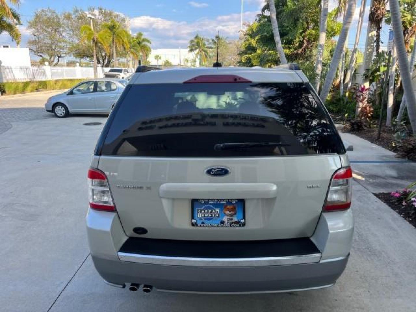 2008 Light Sage Metallic /Camel Ford Taurus X 1 FL SEL LOW MILES 30,485 (1FMDK02W68G) with an 3.5L SMPI 24-Valve V6 Duratec Engine engine, Automatic transmission, located at 4701 North Dixie Hwy, Pompano Beach, FL, 33064, (954) 422-2889, 26.240938, -80.123474 - 2008 FORD TAURUS X SEL NEW $ 28,995 ROAD READY VIN: 1FMDK02W68GA01827 NO RECALLS 3.5L V6 4 DOOR WAGON/SPORT UTILITY 1 OWNER FLORIDA 3.5L V6 F CLEAN 19 SERVICE RECORDS GASOLINE DUAL AC LOW MILES 30,485 FRONT WHEEL DRIVE POWER MIRRORS 3 ROW LEATHER SEATS Alloy Wheels Anti-Theft System Auto-dimming Rea - Photo#99