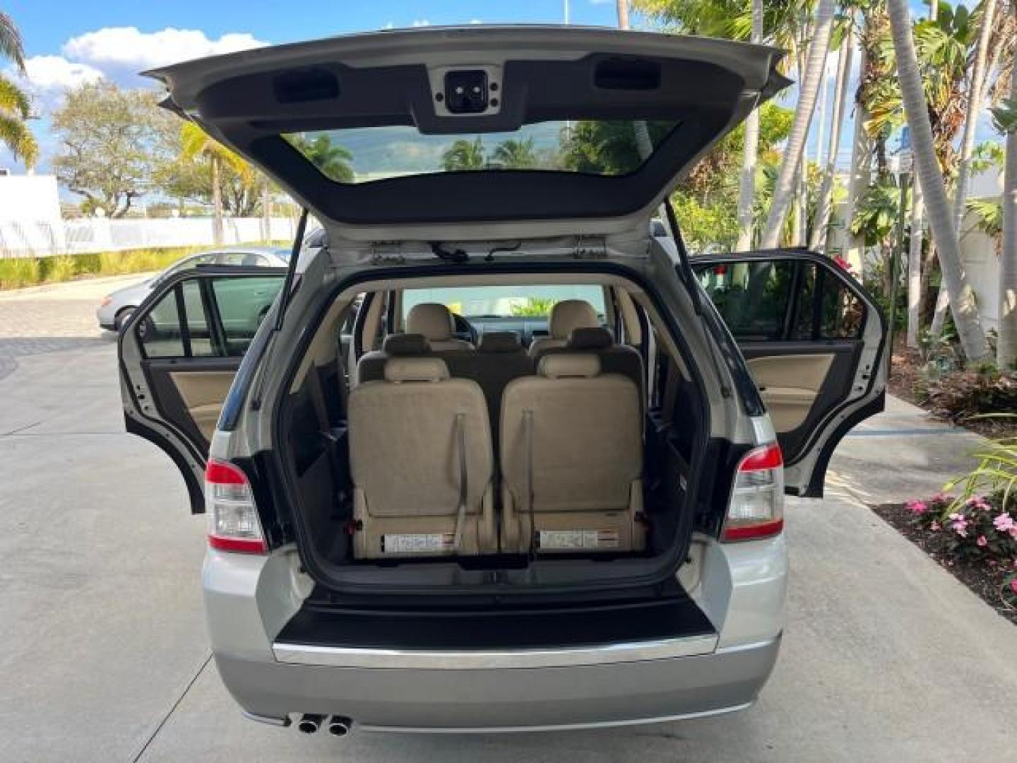 2008 Light Sage Metallic /Camel Ford Taurus X 1 FL SEL LOW MILES 30,485 (1FMDK02W68G) with an 3.5L SMPI 24-Valve V6 Duratec Engine engine, Automatic transmission, located at 4701 North Dixie Hwy, Pompano Beach, FL, 33064, (954) 422-2889, 26.240938, -80.123474 - 2008 FORD TAURUS X SEL NEW $ 28,995 ROAD READY VIN: 1FMDK02W68GA01827 NO RECALLS 3.5L V6 4 DOOR WAGON/SPORT UTILITY 1 OWNER FLORIDA 3.5L V6 F CLEAN 19 SERVICE RECORDS GASOLINE DUAL AC LOW MILES 30,485 FRONT WHEEL DRIVE POWER MIRRORS 3 ROW LEATHER SEATS Alloy Wheels Anti-Theft System Auto-dimming Rea - Photo#15