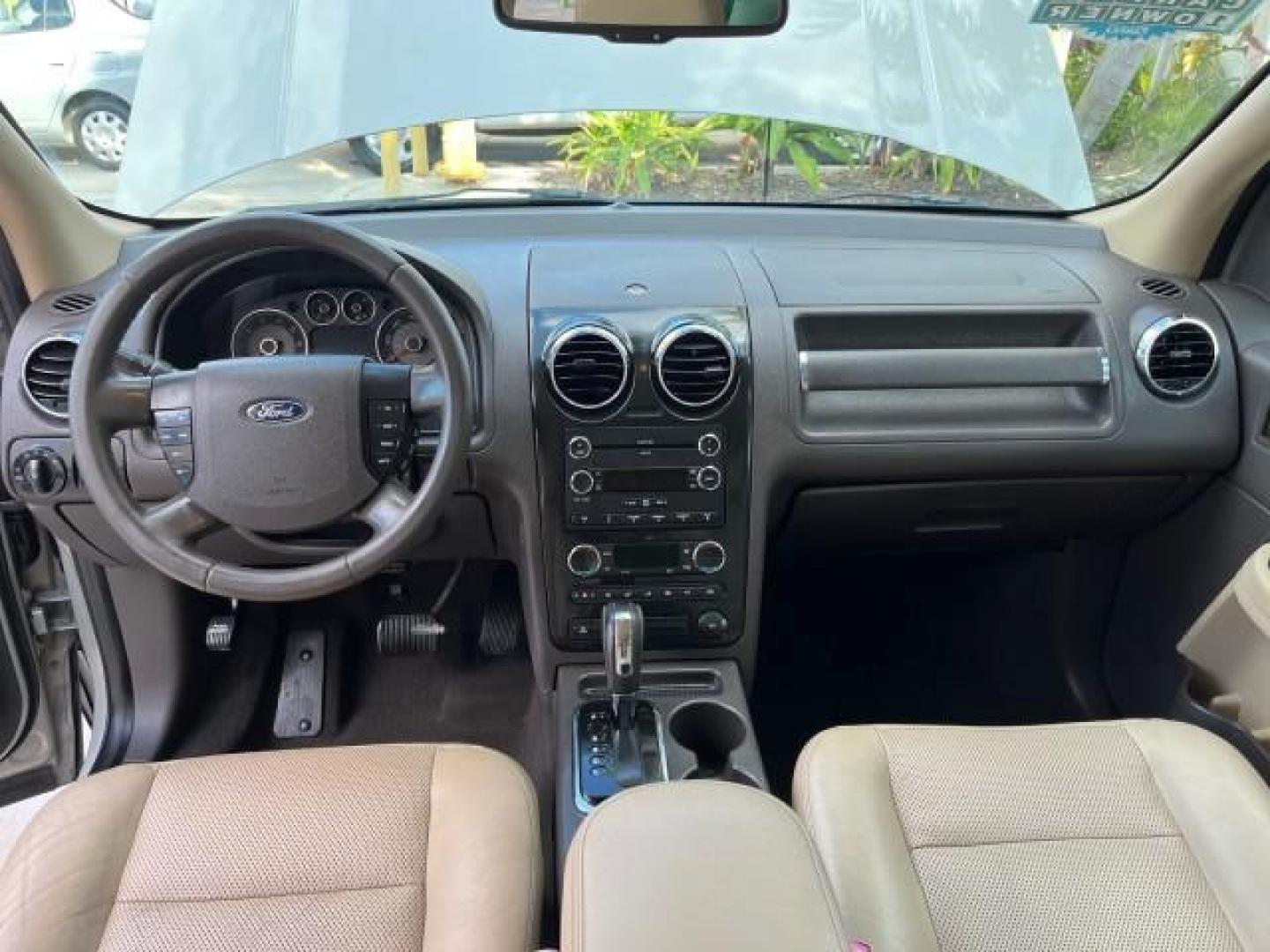 2008 Light Sage Metallic /Camel Ford Taurus X 1 FL SEL LOW MILES 30,485 (1FMDK02W68G) with an 3.5L SMPI 24-Valve V6 Duratec Engine engine, Automatic transmission, located at 4701 North Dixie Hwy, Pompano Beach, FL, 33064, (954) 422-2889, 26.240938, -80.123474 - 2008 FORD TAURUS X SEL NEW $ 28,995 ROAD READY VIN: 1FMDK02W68GA01827 NO RECALLS 3.5L V6 4 DOOR WAGON/SPORT UTILITY 1 OWNER FLORIDA 3.5L V6 F CLEAN 19 SERVICE RECORDS GASOLINE DUAL AC LOW MILES 30,485 FRONT WHEEL DRIVE POWER MIRRORS 3 ROW LEATHER SEATS Alloy Wheels Anti-Theft System Auto-dimming Rea - Photo#35