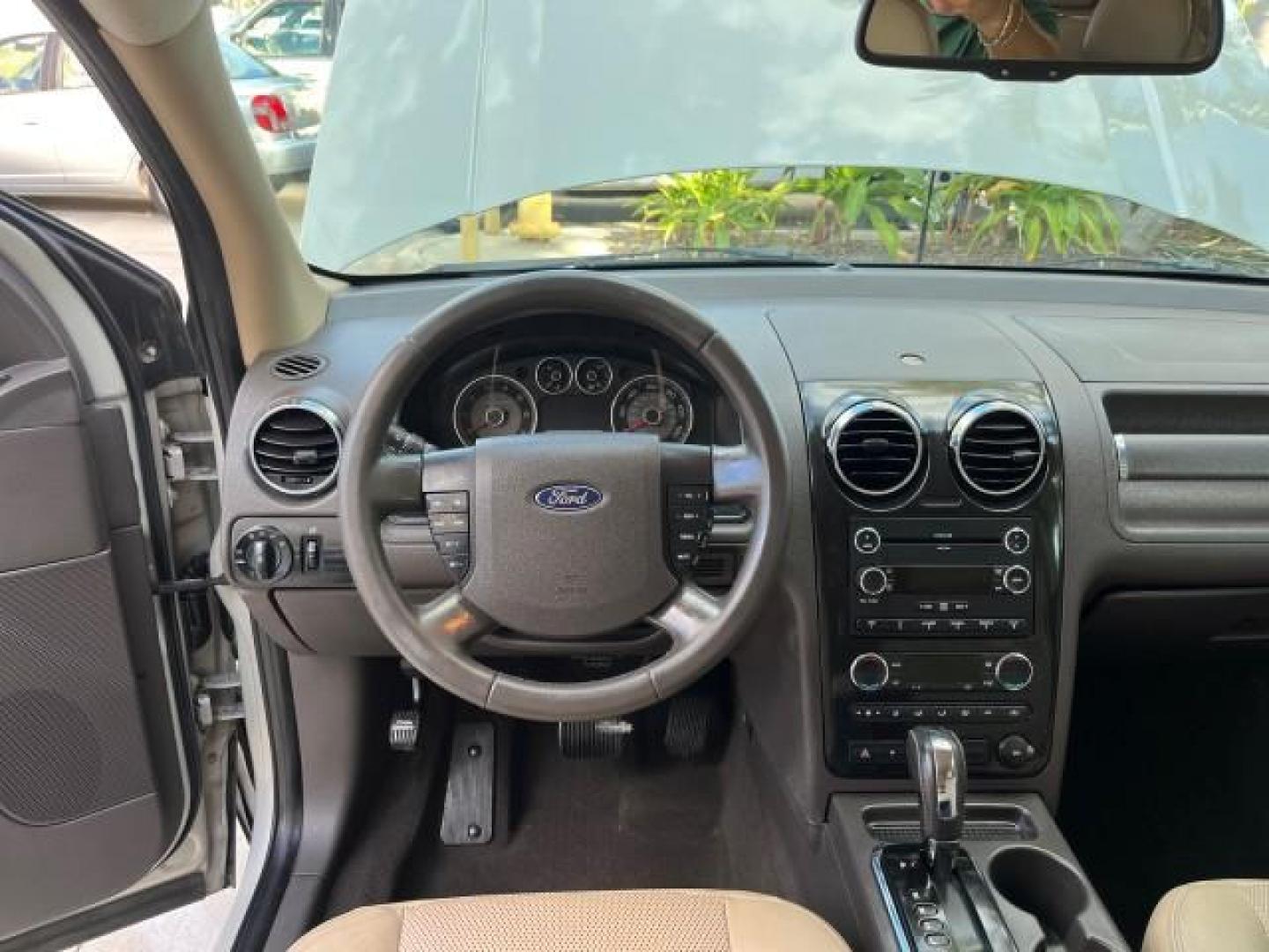 2008 Light Sage Metallic /Camel Ford Taurus X 1 FL SEL LOW MILES 30,485 (1FMDK02W68G) with an 3.5L SMPI 24-Valve V6 Duratec Engine engine, Automatic transmission, located at 4701 North Dixie Hwy, Pompano Beach, FL, 33064, (954) 422-2889, 26.240938, -80.123474 - 2008 FORD TAURUS X SEL NEW $ 28,995 ROAD READY VIN: 1FMDK02W68GA01827 NO RECALLS 3.5L V6 4 DOOR WAGON/SPORT UTILITY 1 OWNER FLORIDA 3.5L V6 F CLEAN 19 SERVICE RECORDS GASOLINE DUAL AC LOW MILES 30,485 FRONT WHEEL DRIVE POWER MIRRORS 3 ROW LEATHER SEATS Alloy Wheels Anti-Theft System Auto-dimming Rea - Photo#36