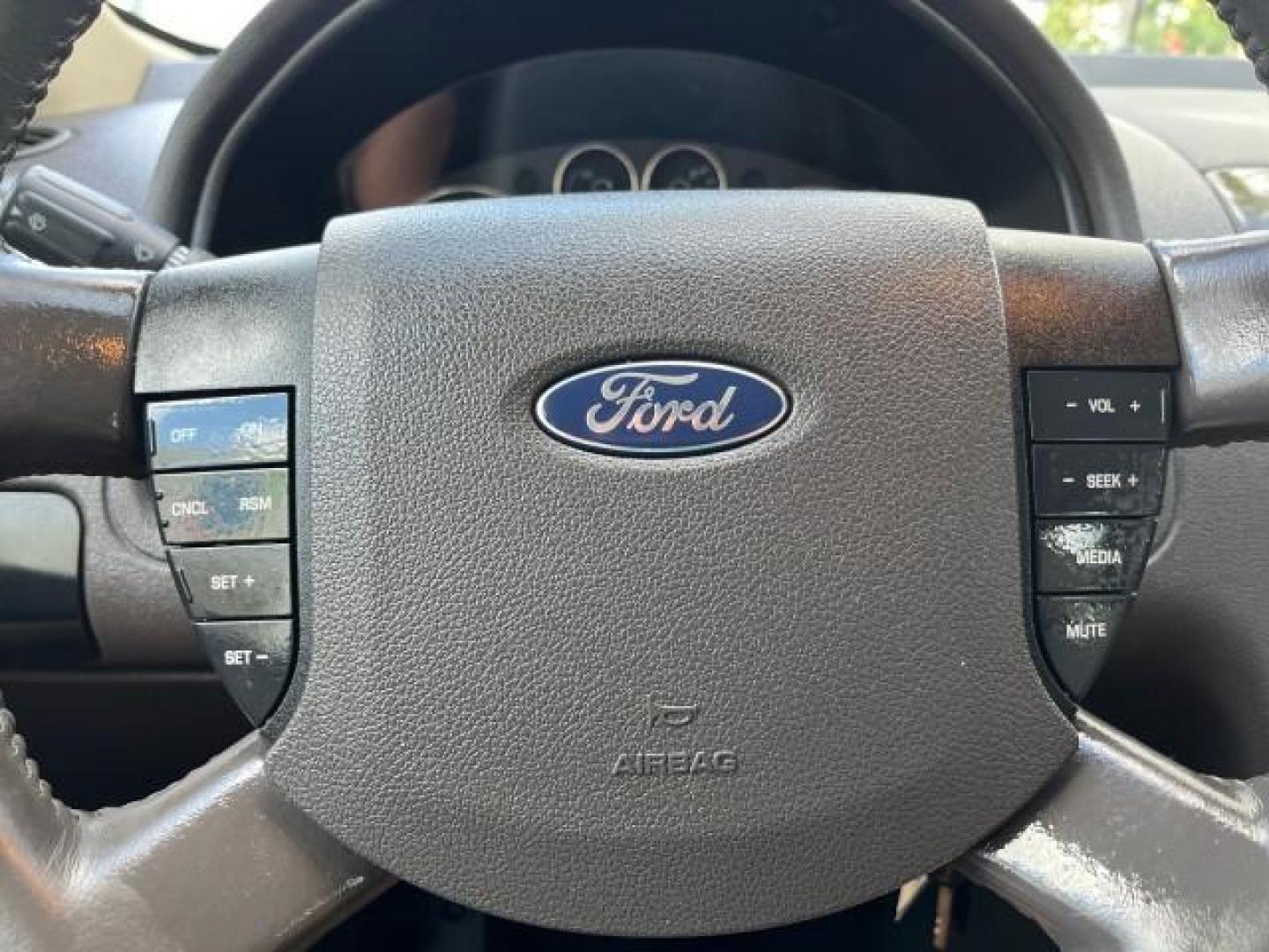 2008 Light Sage Metallic /Camel Ford Taurus X 1 FL SEL LOW MILES 30,485 (1FMDK02W68G) with an 3.5L SMPI 24-Valve V6 Duratec Engine engine, Automatic transmission, located at 4701 North Dixie Hwy, Pompano Beach, FL, 33064, (954) 422-2889, 26.240938, -80.123474 - 2008 FORD TAURUS X SEL NEW $ 28,995 ROAD READY VIN: 1FMDK02W68GA01827 NO RECALLS 3.5L V6 4 DOOR WAGON/SPORT UTILITY 1 OWNER FLORIDA 3.5L V6 F CLEAN 19 SERVICE RECORDS GASOLINE DUAL AC LOW MILES 30,485 FRONT WHEEL DRIVE POWER MIRRORS 3 ROW LEATHER SEATS Alloy Wheels Anti-Theft System Auto-dimming Rea - Photo#46