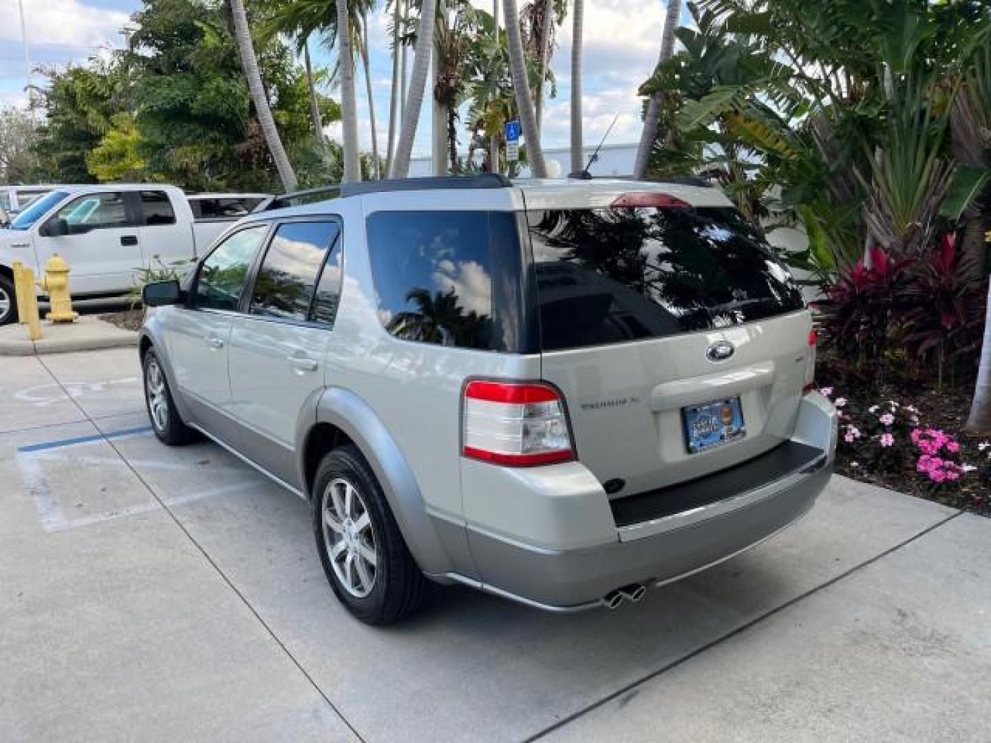 2008 Light Sage Metallic /Camel Ford Taurus X 1 FL SEL LOW MILES 30,485 (1FMDK02W68G) with an 3.5L SMPI 24-Valve V6 Duratec Engine engine, Automatic transmission, located at 4701 North Dixie Hwy, Pompano Beach, FL, 33064, (954) 422-2889, 26.240938, -80.123474 - 2008 FORD TAURUS X SEL NEW $ 28,995 ROAD READY VIN: 1FMDK02W68GA01827 NO RECALLS 3.5L V6 4 DOOR WAGON/SPORT UTILITY 1 OWNER FLORIDA 3.5L V6 F CLEAN 19 SERVICE RECORDS GASOLINE DUAL AC LOW MILES 30,485 FRONT WHEEL DRIVE POWER MIRRORS 3 ROW LEATHER SEATS Alloy Wheels Anti-Theft System Auto-dimming Rea - Photo#5