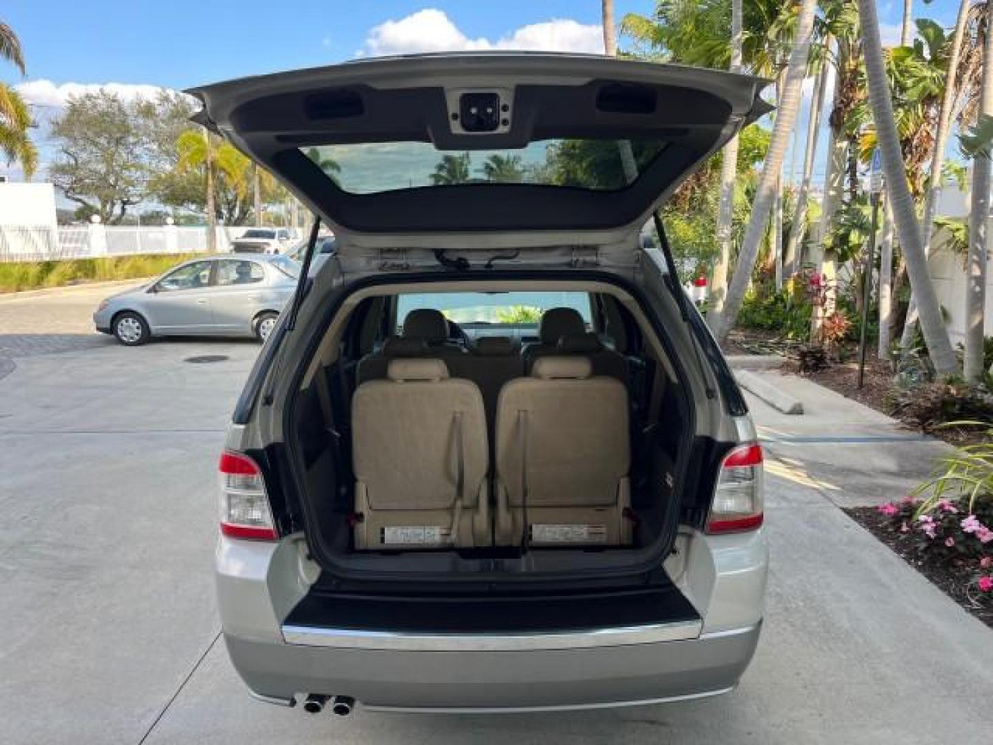 2008 Light Sage Metallic /Camel Ford Taurus X 1 FL SEL LOW MILES 30,485 (1FMDK02W68G) with an 3.5L SMPI 24-Valve V6 Duratec Engine engine, Automatic transmission, located at 4701 North Dixie Hwy, Pompano Beach, FL, 33064, (954) 422-2889, 26.240938, -80.123474 - 2008 FORD TAURUS X SEL NEW $ 28,995 ROAD READY VIN: 1FMDK02W68GA01827 NO RECALLS 3.5L V6 4 DOOR WAGON/SPORT UTILITY 1 OWNER FLORIDA 3.5L V6 F CLEAN 19 SERVICE RECORDS GASOLINE DUAL AC LOW MILES 30,485 FRONT WHEEL DRIVE POWER MIRRORS 3 ROW LEATHER SEATS Alloy Wheels Anti-Theft System Auto-dimming Rea - Photo#63