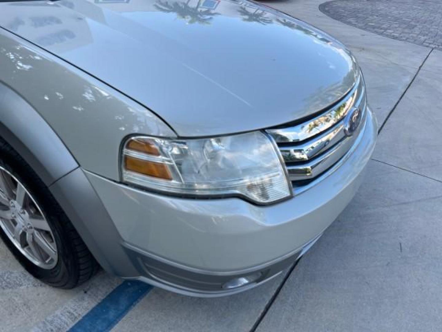 2008 Light Sage Metallic /Camel Ford Taurus X 1 FL SEL LOW MILES 30,485 (1FMDK02W68G) with an 3.5L SMPI 24-Valve V6 Duratec Engine engine, Automatic transmission, located at 4701 North Dixie Hwy, Pompano Beach, FL, 33064, (954) 422-2889, 26.240938, -80.123474 - 2008 FORD TAURUS X SEL NEW $ 28,995 ROAD READY VIN: 1FMDK02W68GA01827 NO RECALLS 3.5L V6 4 DOOR WAGON/SPORT UTILITY 1 OWNER FLORIDA 3.5L V6 F CLEAN 19 SERVICE RECORDS GASOLINE DUAL AC LOW MILES 30,485 FRONT WHEEL DRIVE POWER MIRRORS 3 ROW LEATHER SEATS Alloy Wheels Anti-Theft System Auto-dimming Rea - Photo#86