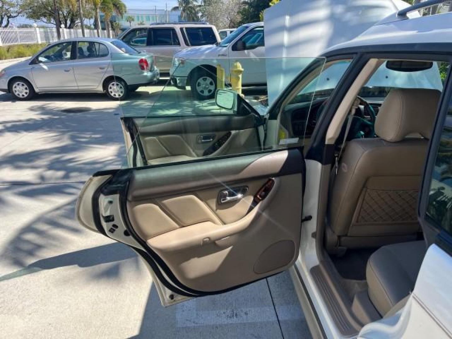 2003 White Frost Pearl /Beige Subaru Legacy Wagon 1 FL Outback H6 L.L. Bean Edition (4S3BH806937) with an 3.0L DOHC SMPI 24-Valve 6-Cyl HO Boxer Engine engine, Automatic transmission, located at 4701 North Dixie Hwy, Pompano Beach, FL, 33064, (954) 422-2889, 26.240938, -80.123474 - 2003 SUBARU OUTBACK L.L. BEAN EDITION ROAD READY 3.0L V6 VIN: 4S3BH806937607756 ALL WHEEL DRIVE WAGON 4 DR 27 MPG AWD 22 SERVICE RECORDS 3.0L H6 F DOHC 24V NO RECALLS 1 OWNER FLORIDA GASOLINE POWER HEATED MIRRORS LOW MILES 94,079 ALL WHEEL DRIVE POWER LEATHER SEATS POWER SUNROOF AWD Alloy Wheels Ant - Photo#13