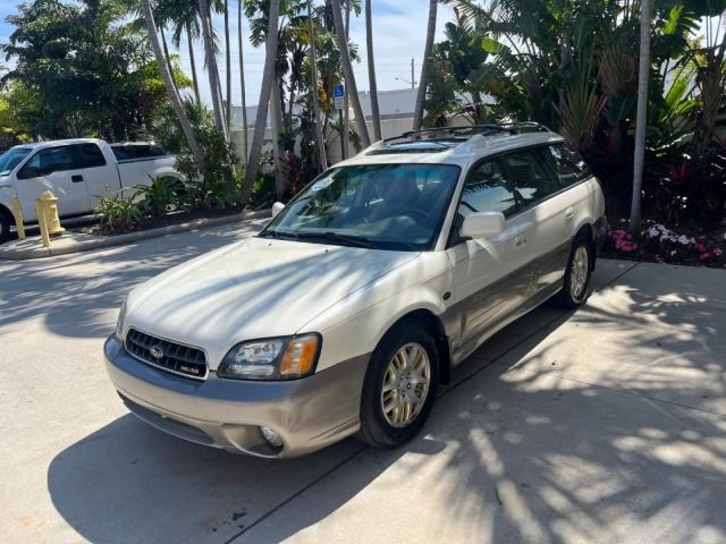 2003 White Frost Pearl /Beige Subaru Legacy Wagon 1 FL Outback H6 L.L. Bean Edition (4S3BH806937) with an 3.0L DOHC SMPI 24-Valve 6-Cyl HO Boxer Engine engine, Automatic transmission, located at 4701 North Dixie Hwy, Pompano Beach, FL, 33064, (954) 422-2889, 26.240938, -80.123474 - 2003 SUBARU OUTBACK L.L. BEAN EDITION ROAD READY 3.0L V6 VIN: 4S3BH806937607756 ALL WHEEL DRIVE WAGON 4 DR 27 MPG AWD 22 SERVICE RECORDS 3.0L H6 F DOHC 24V NO RECALLS 1 OWNER FLORIDA GASOLINE POWER HEATED MIRRORS LOW MILES 94,079 ALL WHEEL DRIVE POWER LEATHER SEATS POWER SUNROOF AWD Alloy Wheels Ant - Photo#3