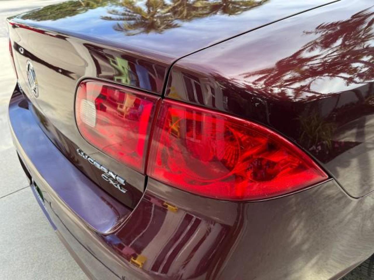 2006 Dark Garnet Metallic /Cashmere Buick Lucerne CXL LOW MILES 22,981 (1G4HD57206U) with an 3.8L 3800 V6 SFI Engine engine, Automatic transmission, located at 4701 North Dixie Hwy, Pompano Beach, FL, 33064, (954) 422-2889, 26.240938, -80.123474 - 2006 BUICK LUCERNE CXL V6 ROAD READY 3.8L V6 VIN: 1G4HD57206U163160 NO RECALLS 28 MPG SEDAN 4 DR BACK UP SENSORS POWER LEATHER SEATS 3.8L V6 F HEATED AND COOLED SEATS POWER MIRRORS GASOLINE BLUETOOTH DUAL ZONE AC 11 SERVICE RECORDS FRONT WHEEL DRIVE SUPER LOW MILES 22,981 FLORIDA OWNER Adaptive Head - Photo#99