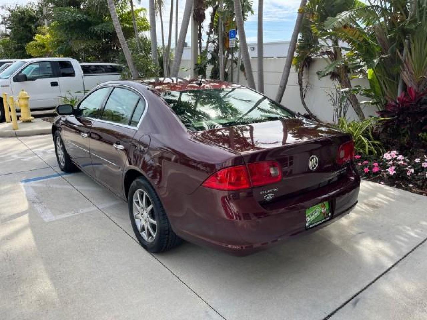 2006 Dark Garnet Metallic /Cashmere Buick Lucerne CXL LOW MILES 22,981 (1G4HD57206U) with an 3.8L 3800 V6 SFI Engine engine, Automatic transmission, located at 4701 North Dixie Hwy, Pompano Beach, FL, 33064, (954) 422-2889, 26.240938, -80.123474 - 2006 BUICK LUCERNE CXL V6 ROAD READY 3.8L V6 VIN: 1G4HD57206U163160 NO RECALLS 28 MPG SEDAN 4 DR BACK UP SENSORS POWER LEATHER SEATS 3.8L V6 F HEATED AND COOLED SEATS POWER MIRRORS GASOLINE BLUETOOTH DUAL ZONE AC 11 SERVICE RECORDS FRONT WHEEL DRIVE SUPER LOW MILES 22,981 FLORIDA OWNER Adaptive Head - Photo#5