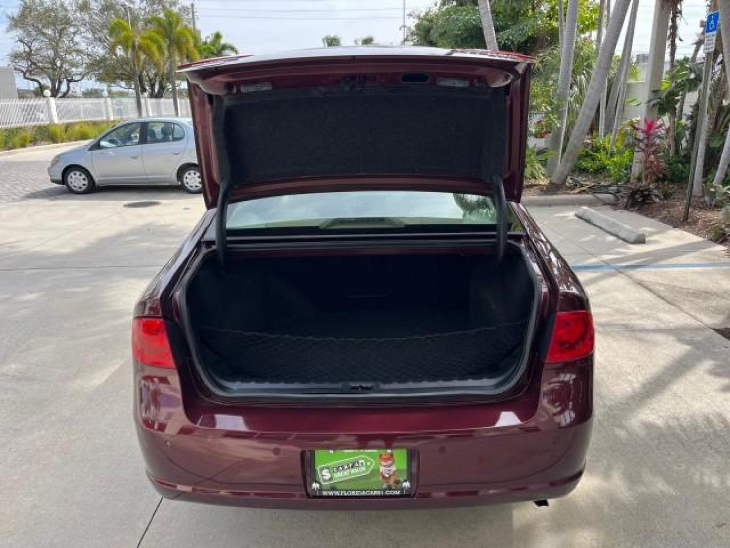 2006 Dark Garnet Metallic /Cashmere Buick Lucerne CXL LOW MILES 22,981 (1G4HD57206U) with an 3.8L 3800 V6 SFI Engine engine, Automatic transmission, located at 4701 North Dixie Hwy, Pompano Beach, FL, 33064, (954) 422-2889, 26.240938, -80.123474 - 2006 BUICK LUCERNE CXL V6 ROAD READY 3.8L V6 VIN: 1G4HD57206U163160 NO RECALLS 28 MPG SEDAN 4 DR BACK UP SENSORS POWER LEATHER SEATS 3.8L V6 F HEATED AND COOLED SEATS POWER MIRRORS GASOLINE BLUETOOTH DUAL ZONE AC 11 SERVICE RECORDS FRONT WHEEL DRIVE SUPER LOW MILES 22,981 FLORIDA OWNER Adaptive Head - Photo#68