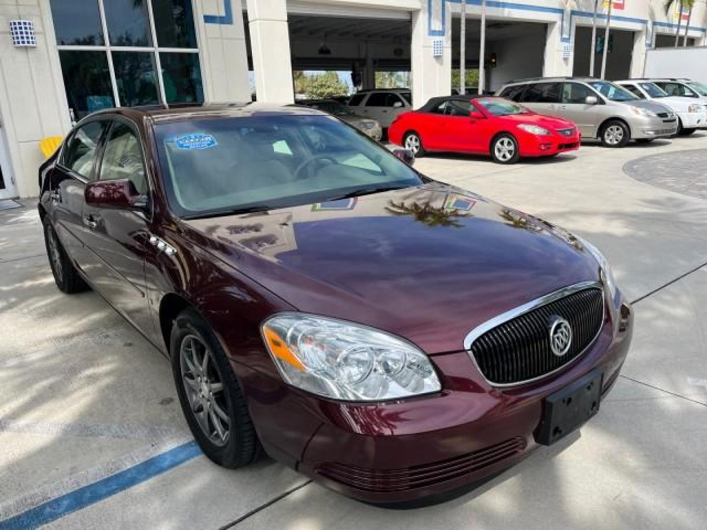 2006 Dark Garnet Metallic /Cashmere Buick Lucerne CXL LOW MILES 22,981 (1G4HD57206U) with an 3.8L 3800 V6 SFI Engine engine, Automatic transmission, located at 4701 North Dixie Hwy, Pompano Beach, FL, 33064, (954) 422-2889, 26.240938, -80.123474 - 2006 BUICK LUCERNE CXL V6 ROAD READY 3.8L V6 VIN: 1G4HD57206U163160 NO RECALLS 28 MPG SEDAN 4 DR BACK UP SENSORS POWER LEATHER SEATS 3.8L V6 F HEATED AND COOLED SEATS POWER MIRRORS GASOLINE BLUETOOTH DUAL ZONE AC 11 SERVICE RECORDS FRONT WHEEL DRIVE SUPER LOW MILES 22,981 FLORIDA OWNER Adaptive Head - Photo#76