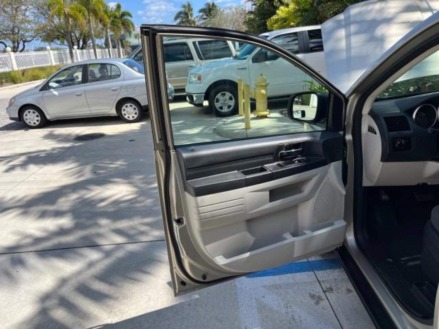 2008 Light Sandstone Metallic /Md Slate/Lt Shale Dodge Grand Caravan SE LOW HANDICAP MILES 76,328 (1D8HN44H98B) with an 3.3L V6 Cylinder Engine engine, Automatic transmission, located at 4701 North Dixie Hwy, Pompano Beach, FL, 33064, (954) 422-2889, 26.240938, -80.123474 - OUR WEBPAGE FLORIDACARS1.COM HAS OVER 100 PHOTOS AND FREE CARFAX LINK 2008 DODGE GRAND CARAVAN SE HANDICAP LIFT ROAD READY 3.3L V6 VIN: 1D8HN44H98B188711 FLORIDA OWNER VAN NO RECALLS 3.3L V6 F 24 SERVICE RECORDS GASOLINE 24 MPG LOW MILES 76,328 FRONT WHEEL DRIVE POWER MIRRORS 3 ROW SEATS Anti-Theft - Photo#9