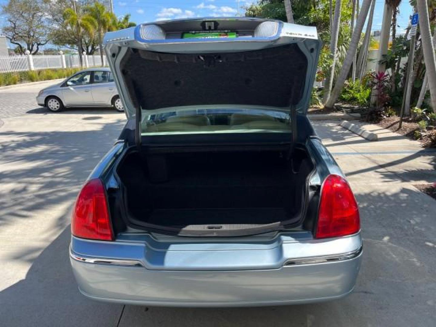 2008 Light Ice Blue Metallic /Light Camel Lincoln Town Car Limited LOW MILES 27,024 (2LNHM82V68X) with an 4.6L SOHC FFV V8 Engine engine, Automatic transmission, located at 4701 North Dixie Hwy, Pompano Beach, FL, 33064, (954) 422-2889, 26.240938, -80.123474 - 2008 LINCOLN TOWN CAR SIGNATURE LIMITED NEW $ 45,985 ROAD READY VIN: 2LNHM82V68X642584 NO ACCIDENTS NO RECALLS SEDAN 4 DR $5000 PKG PALM BEACH EDITION 8 SERVICE RECORDS 4.6L V8 F SOHC PARKING SENSORS POWER LEATHER SEATS FLEX FUEL DUAL ZONE AC POWER MIRRORS 4.6L V8 REAR WHEEL DRIVE SIGNATURE LIMITED - Photo#63