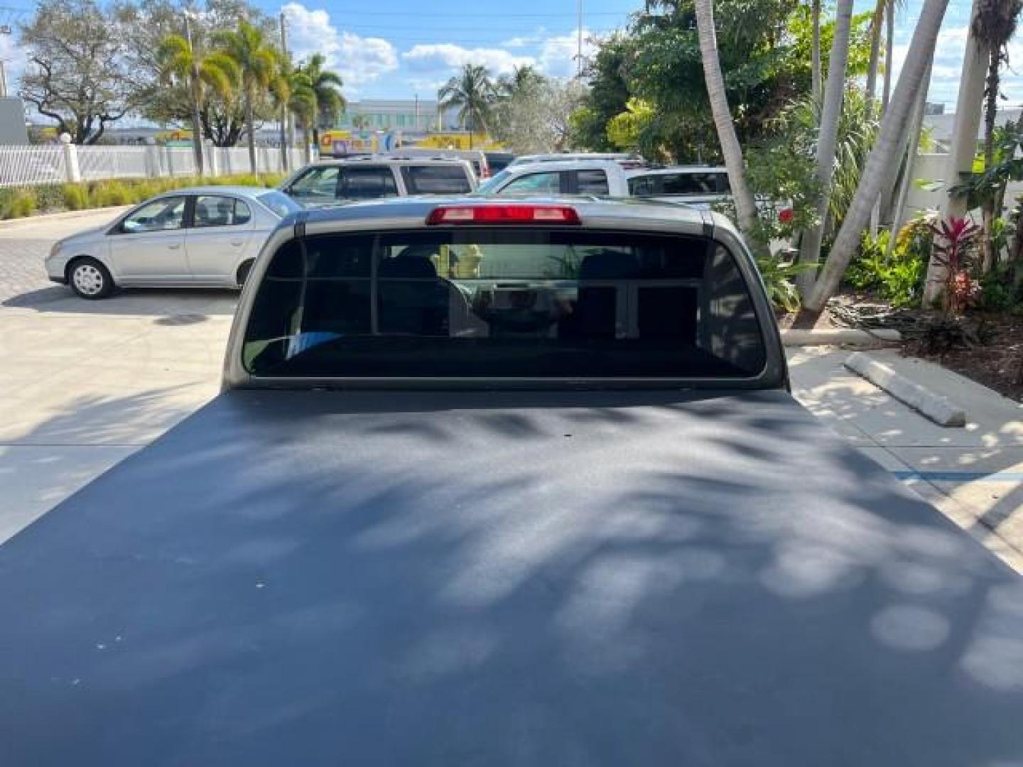 2007 Storm Gray /Charcoal Nissan Frontier SE 4 DR LOW MILES 71,664 (1N6AD07U27C) with an 4.0L DOHC 24-Valve V6 Engine engine, Automatic transmission, located at 4701 North Dixie Hwy, Pompano Beach, FL, 33064, (954) 422-2889, 26.240938, -80.123474 - 2007 NISSAN FRONTIER SE 4 DR ROAD READY 4.OL V6 VIN: 1N6AD07U27C438803 NO ACCIDENTS CREW PICKUP 18 SERVICE RECORDS 4.0L V6 F DOHC 24V LOW MILES 71,664 GASOLINE POWER MIRRORS REAR WHEEL DRIVE 5 FT BED TOW HITCH Alloy Wheels Cloth Seats Bed Liner Tow Hitch THIS IS ONE OF THE NICEST NISSANS WE HAVE EVE - Photo#99