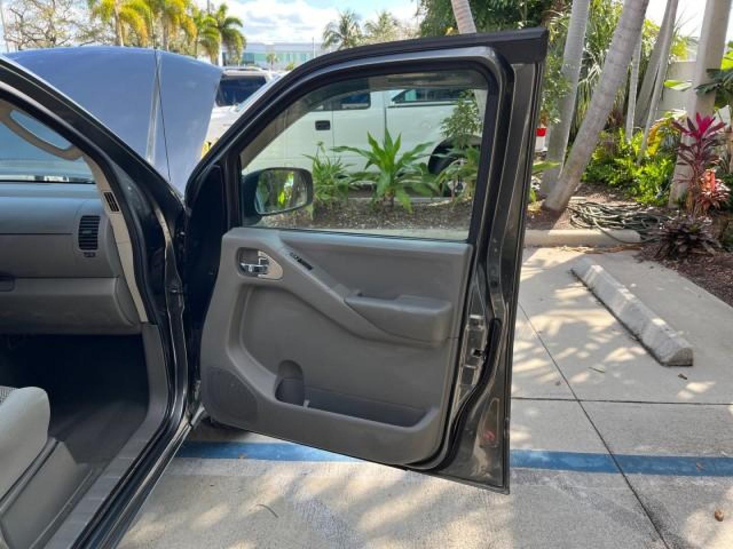 2007 Storm Gray /Charcoal Nissan Frontier SE 4 DR LOW MILES 71,664 (1N6AD07U27C) with an 4.0L DOHC 24-Valve V6 Engine engine, Automatic transmission, located at 4701 North Dixie Hwy, Pompano Beach, FL, 33064, (954) 422-2889, 26.240938, -80.123474 - 2007 NISSAN FRONTIER SE 4 DR ROAD READY 4.OL V6 VIN: 1N6AD07U27C438803 NO ACCIDENTS CREW PICKUP 18 SERVICE RECORDS 4.0L V6 F DOHC 24V LOW MILES 71,664 GASOLINE POWER MIRRORS REAR WHEEL DRIVE 5 FT BED TOW HITCH Alloy Wheels Cloth Seats Bed Liner Tow Hitch THIS IS ONE OF THE NICEST NISSANS WE HAVE EVE - Photo#11