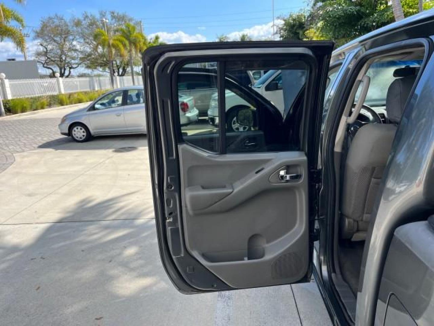 2007 Storm Gray /Charcoal Nissan Frontier SE 4 DR LOW MILES 71,664 (1N6AD07U27C) with an 4.0L DOHC 24-Valve V6 Engine engine, Automatic transmission, located at 4701 North Dixie Hwy, Pompano Beach, FL, 33064, (954) 422-2889, 26.240938, -80.123474 - 2007 NISSAN FRONTIER SE 4 DR ROAD READY 4.OL V6 VIN: 1N6AD07U27C438803 NO ACCIDENTS CREW PICKUP 18 SERVICE RECORDS 4.0L V6 F DOHC 24V LOW MILES 71,664 GASOLINE POWER MIRRORS REAR WHEEL DRIVE 5 FT BED TOW HITCH Alloy Wheels Cloth Seats Bed Liner Tow Hitch THIS IS ONE OF THE NICEST NISSANS WE HAVE EVE - Photo#13