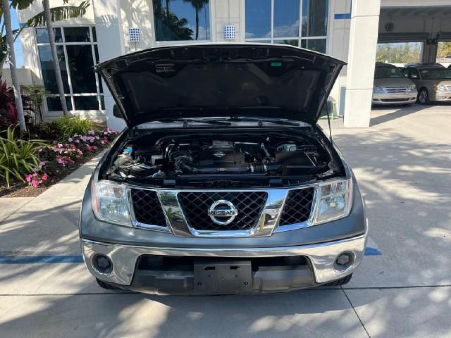 2007 Storm Gray /Charcoal Nissan Frontier SE 4 DR LOW MILES 71,664 (1N6AD07U27C) with an 4.0L DOHC 24-Valve V6 Engine engine, Automatic transmission, located at 4701 North Dixie Hwy, Pompano Beach, FL, 33064, (954) 422-2889, 26.240938, -80.123474 - 2007 NISSAN FRONTIER SE 4 DR ROAD READY 4.OL V6 VIN: 1N6AD07U27C438803 NO ACCIDENTS CREW PICKUP 18 SERVICE RECORDS 4.0L V6 F DOHC 24V LOW MILES 71,664 GASOLINE POWER MIRRORS REAR WHEEL DRIVE 5 FT BED TOW HITCH Alloy Wheels Cloth Seats Bed Liner Tow Hitch THIS IS ONE OF THE NICEST NISSANS WE HAVE EVE - Photo#65