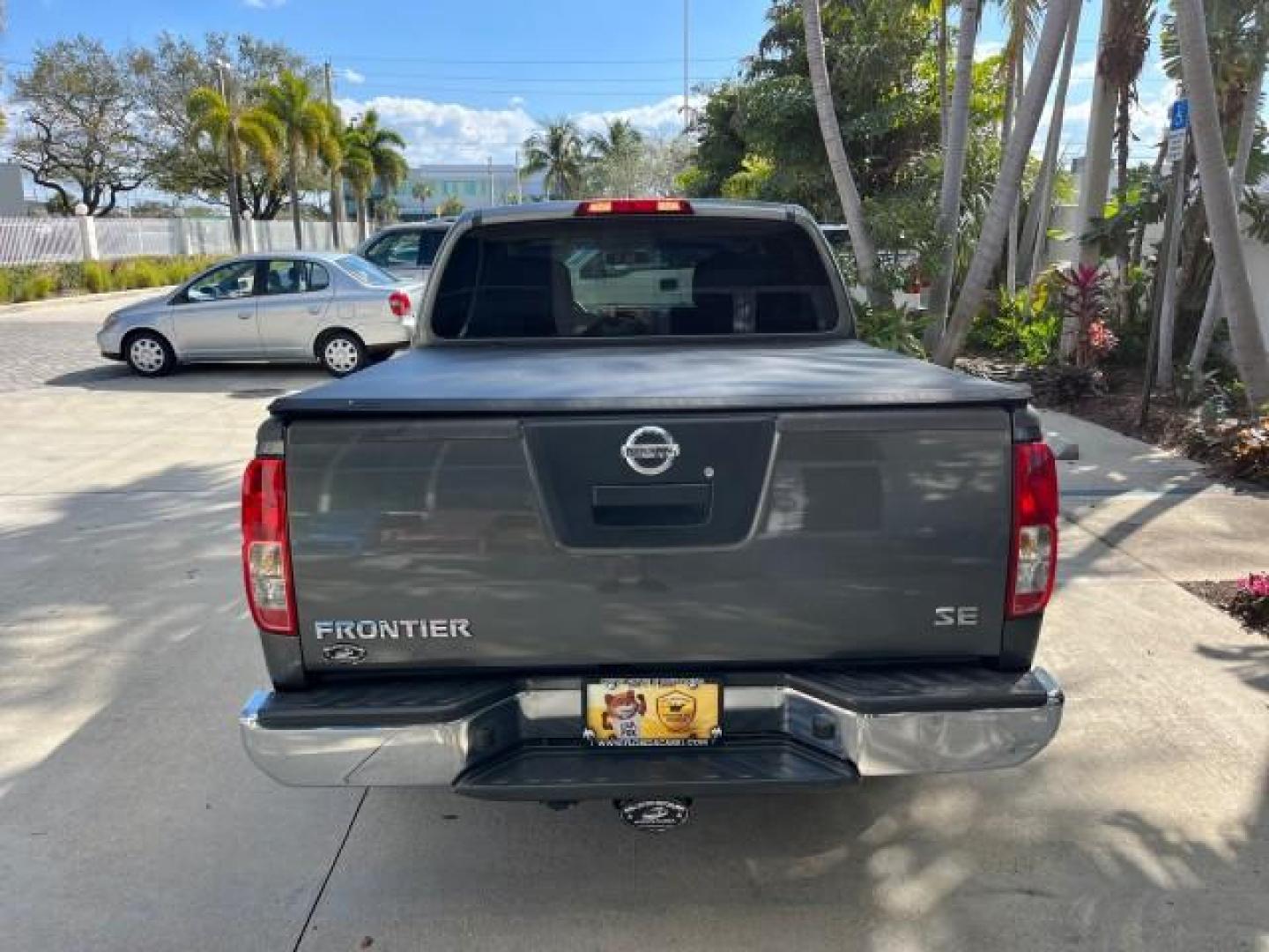 2007 Storm Gray /Charcoal Nissan Frontier SE 4 DR LOW MILES 71,664 (1N6AD07U27C) with an 4.0L DOHC 24-Valve V6 Engine engine, Automatic transmission, located at 4701 North Dixie Hwy, Pompano Beach, FL, 33064, (954) 422-2889, 26.240938, -80.123474 - 2007 NISSAN FRONTIER SE 4 DR ROAD READY 4.OL V6 VIN: 1N6AD07U27C438803 NO ACCIDENTS CREW PICKUP 18 SERVICE RECORDS 4.0L V6 F DOHC 24V LOW MILES 71,664 GASOLINE POWER MIRRORS REAR WHEEL DRIVE 5 FT BED TOW HITCH Alloy Wheels Cloth Seats Bed Liner Tow Hitch THIS IS ONE OF THE NICEST NISSANS WE HAVE EVE - Photo#6