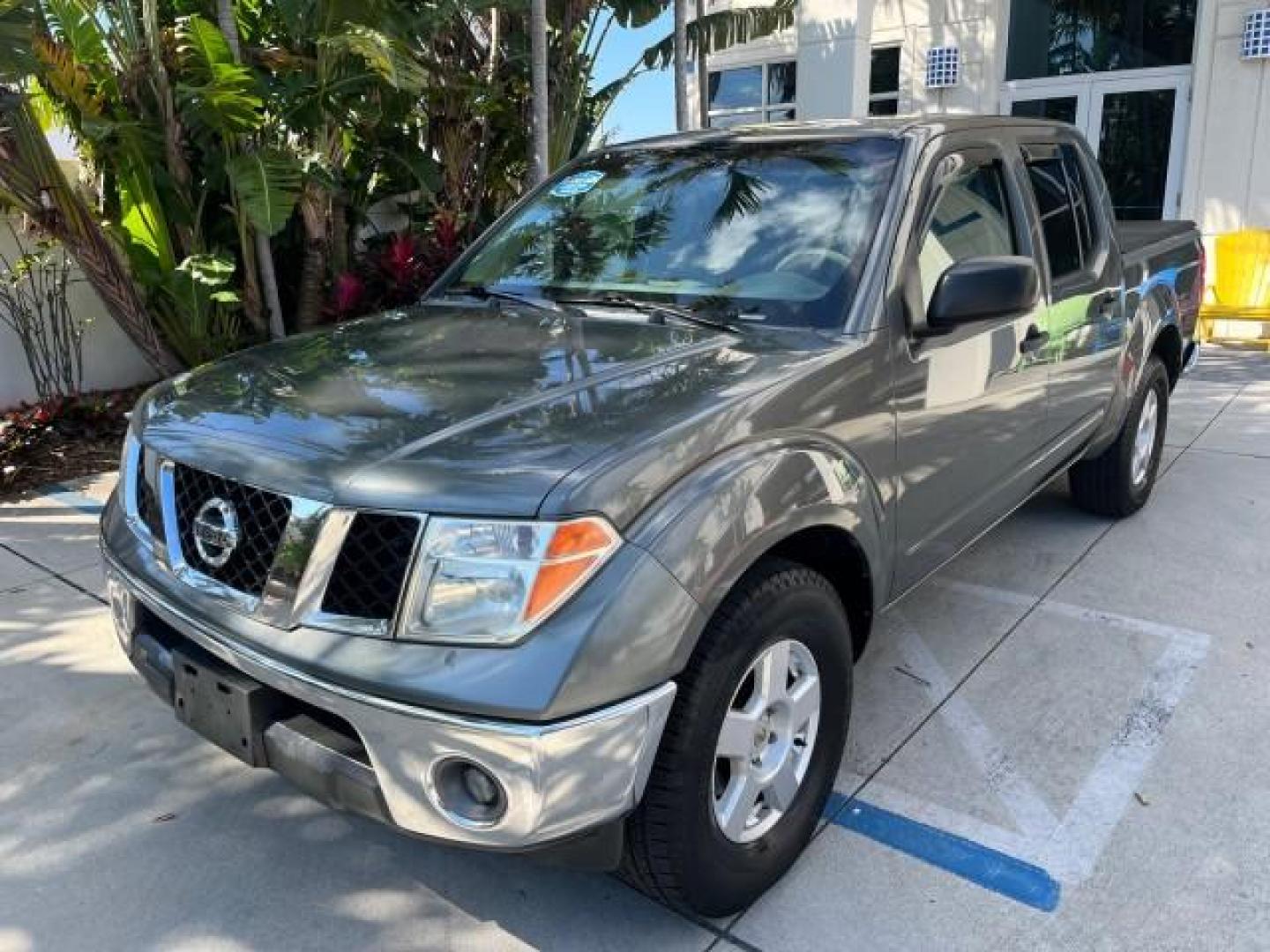 2007 Storm Gray /Charcoal Nissan Frontier SE 4 DR LOW MILES 71,664 (1N6AD07U27C) with an 4.0L DOHC 24-Valve V6 Engine engine, Automatic transmission, located at 4701 North Dixie Hwy, Pompano Beach, FL, 33064, (954) 422-2889, 26.240938, -80.123474 - 2007 NISSAN FRONTIER SE 4 DR ROAD READY 4.OL V6 VIN: 1N6AD07U27C438803 NO ACCIDENTS CREW PICKUP 18 SERVICE RECORDS 4.0L V6 F DOHC 24V LOW MILES 71,664 GASOLINE POWER MIRRORS REAR WHEEL DRIVE 5 FT BED TOW HITCH Alloy Wheels Cloth Seats Bed Liner Tow Hitch THIS IS ONE OF THE NICEST NISSANS WE HAVE EVE - Photo#71