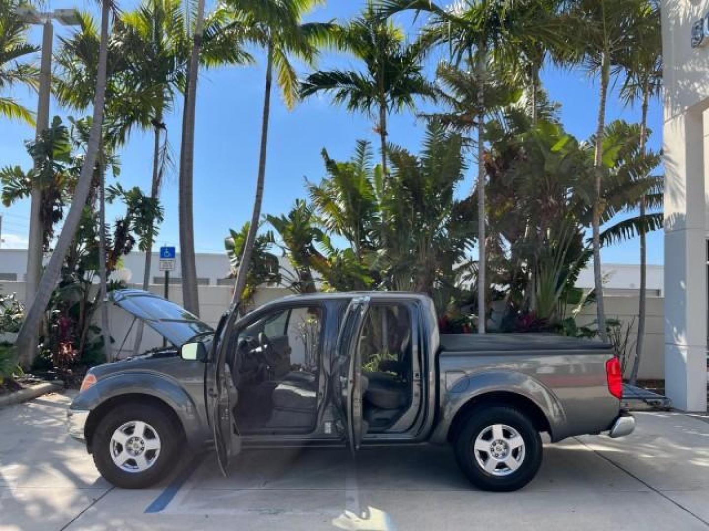 2007 Storm Gray /Charcoal Nissan Frontier SE 4 DR LOW MILES 71,664 (1N6AD07U27C) with an 4.0L DOHC 24-Valve V6 Engine engine, Automatic transmission, located at 4701 North Dixie Hwy, Pompano Beach, FL, 33064, (954) 422-2889, 26.240938, -80.123474 - 2007 NISSAN FRONTIER SE 4 DR ROAD READY 4.OL V6 VIN: 1N6AD07U27C438803 NO ACCIDENTS CREW PICKUP 18 SERVICE RECORDS 4.0L V6 F DOHC 24V LOW MILES 71,664 GASOLINE POWER MIRRORS REAR WHEEL DRIVE 5 FT BED TOW HITCH Alloy Wheels Cloth Seats Bed Liner Tow Hitch THIS IS ONE OF THE NICEST NISSANS WE HAVE EVE - Photo#8