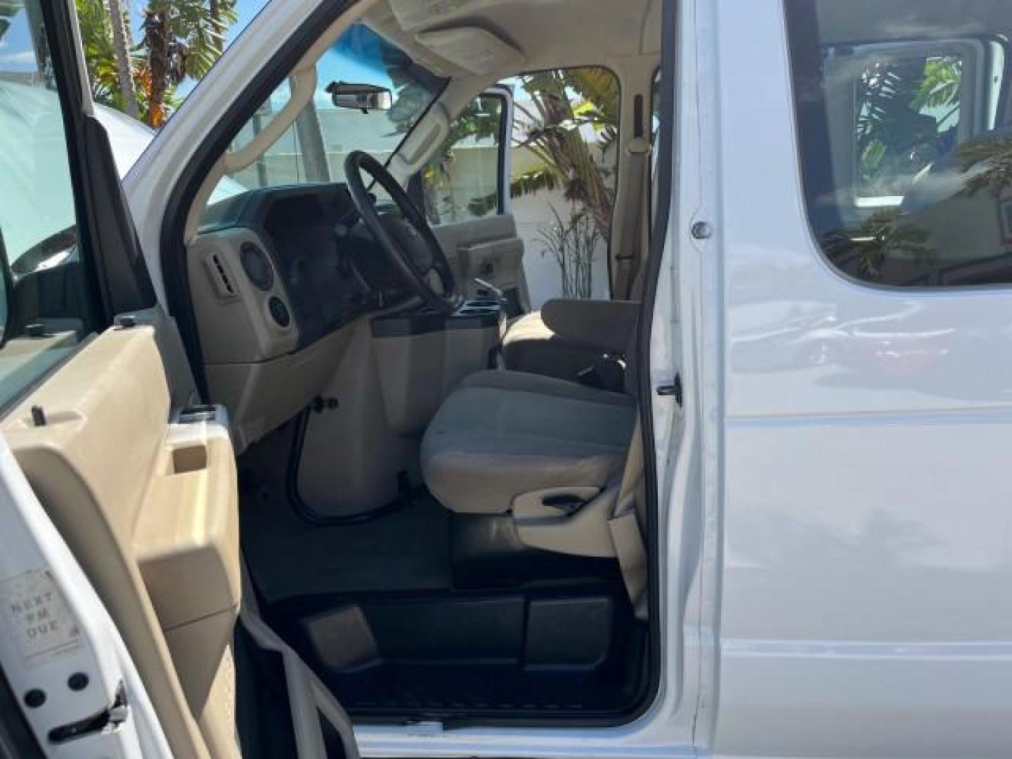 2010 Oxford White /Medium Flint Ford Econoline Wagon 15 PASS XLT LOW MILES 75,859 (1FBSS3BL2AD) with an 5.4L EFI FFV V8 Engine engine, Automatic transmission, located at 4701 North Dixie Hwy, Pompano Beach, FL, 33064, (954) 422-2889, 26.240938, -80.123474 - 2010 FORD E-SERIES E-350 SD XLT ROAD READY 5.4L V8 VIN: 1FBSS3BL2ADA46049 FLORIDA OWNER VAN LOW MILES 75,859 5.4L V8 F SOHC 16V 7 SERVICE RECORDS GASOLINE NO RECALLS 15 PASSENGER REAR WHEEL DRIVE POWER MIRRORS 4 ROW SEATS Auxiliary Engine Cooler Cruise Control Electronic Braking System Electronic Tr - Photo#10