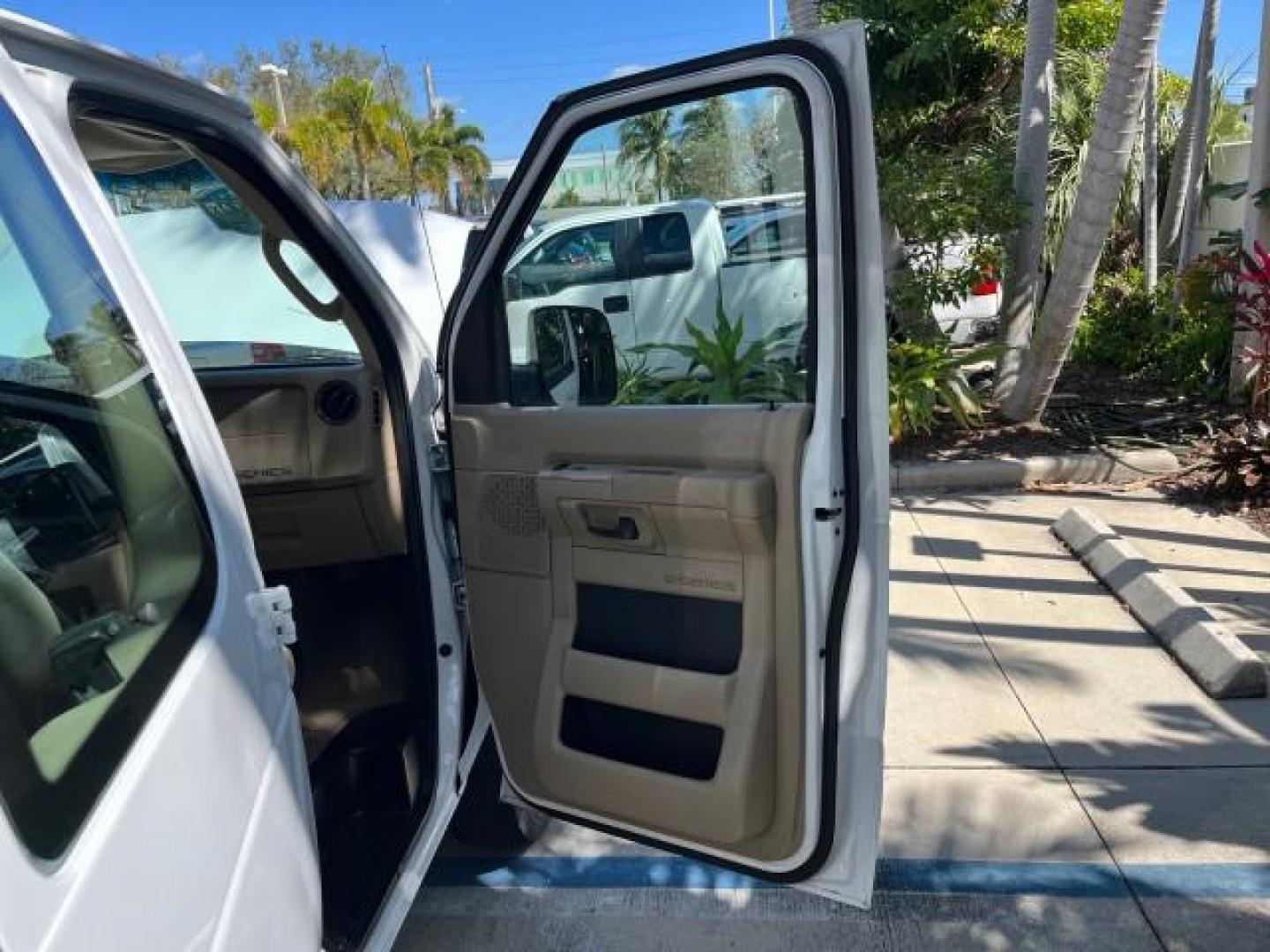 2010 Oxford White /Medium Flint Ford Econoline Wagon 15 PASS XLT LOW MILES 75,859 (1FBSS3BL2AD) with an 5.4L EFI FFV V8 Engine engine, Automatic transmission, located at 4701 North Dixie Hwy, Pompano Beach, FL, 33064, (954) 422-2889, 26.240938, -80.123474 - 2010 FORD E-SERIES E-350 SD XLT ROAD READY 5.4L V8 VIN: 1FBSS3BL2ADA46049 FLORIDA OWNER VAN LOW MILES 75,859 5.4L V8 F SOHC 16V 7 SERVICE RECORDS GASOLINE NO RECALLS 15 PASSENGER REAR WHEEL DRIVE POWER MIRRORS 4 ROW SEATS Auxiliary Engine Cooler Cruise Control Electronic Braking System Electronic Tr - Photo#11