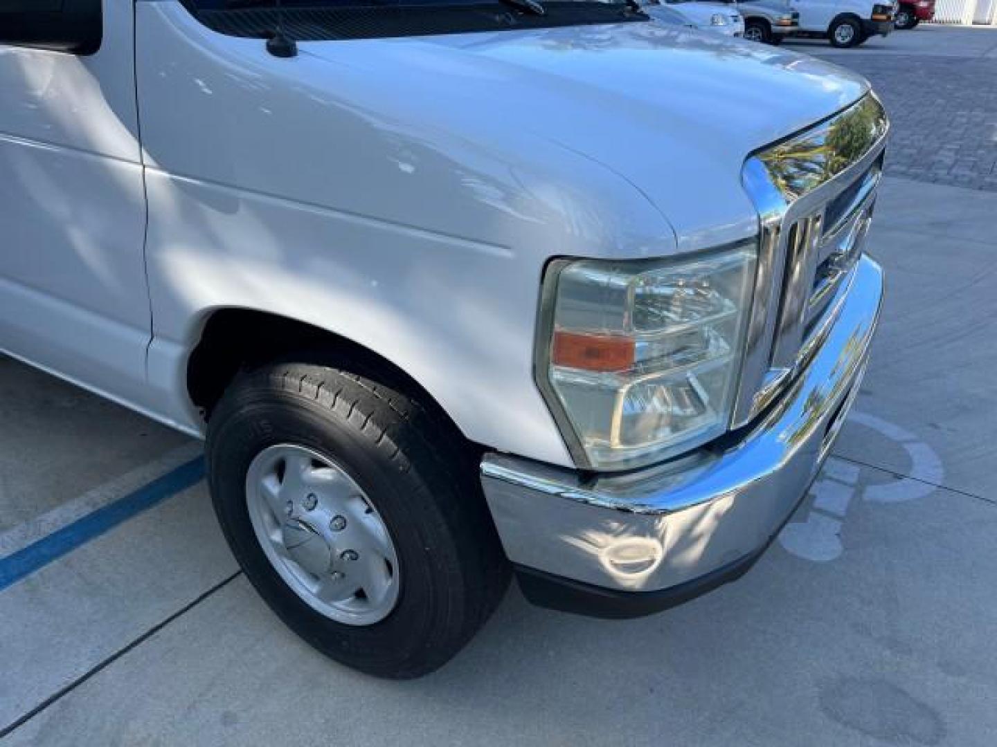 2010 Oxford White /Medium Flint Ford Econoline Wagon 15 PASS XLT LOW MILES 75,859 (1FBSS3BL2AD) with an 5.4L EFI FFV V8 Engine engine, Automatic transmission, located at 4701 North Dixie Hwy, Pompano Beach, FL, 33064, (954) 422-2889, 26.240938, -80.123474 - 2010 FORD E-SERIES E-350 SD XLT ROAD READY 5.4L V8 VIN: 1FBSS3BL2ADA46049 FLORIDA OWNER VAN LOW MILES 75,859 5.4L V8 F SOHC 16V 7 SERVICE RECORDS GASOLINE NO RECALLS 15 PASSENGER REAR WHEEL DRIVE POWER MIRRORS 4 ROW SEATS Auxiliary Engine Cooler Cruise Control Electronic Braking System Electronic Tr - Photo#77