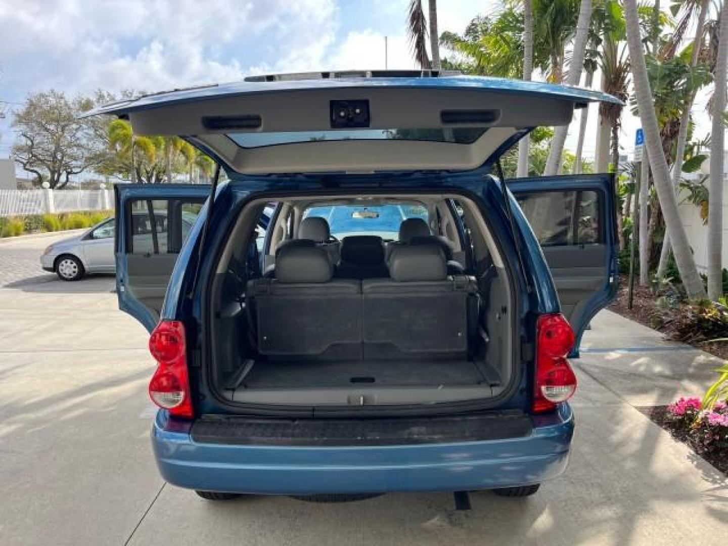 2004 Atlantic Blue Pearl /Med Slate Gray Dodge Durango SLT LOW MILES 44,062 HEMI (1D4HD48D84F) with an 5.7L V8 SMPI Hemi Magnum Engine engine, Automatic transmission, located at 4701 North Dixie Hwy, Pompano Beach, FL, 33064, (954) 422-2889, 26.240938, -80.123474 - 2004 DODGE DURANGO SLT ROAD READY 5.7L V8 VIN: 1D4HD48D84F150174 NO ACCIDENTS NO RECALLS 4 DOOR WAGON/SPORT UTILITY 1 OWNER LOW MILES 44,062 5.7L V8 F HEMI 3 ROW LEATHER SEATS GASOLINE 23 SERVICE RECORDS REAR WHEEL DRIVE BLUETOOTH Approach Lights Black Roof Rack Cruise Control Fog Lights Front Bucke - Photo#15