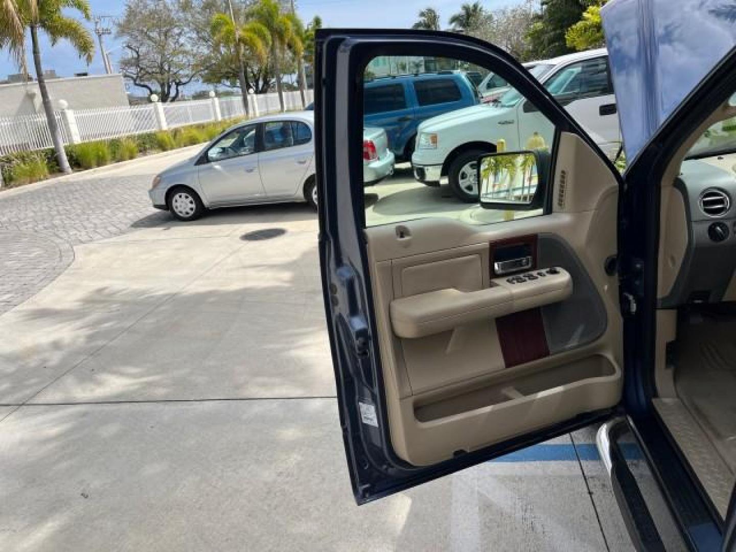 2005 Med Wedgewood Blue Metallic /Tan Ford F-150 Lariat 4 DR LOW MILES 66,727 (1FTPW12515F) with an 5.4L 3v EFI V8 Engine engine, Automatic transmission, located at 4701 North Dixie Hwy, Pompano Beach, FL, 33064, (954) 422-2889, 26.240938, -80.123474 - 2005 FORD F-150 XLT LARIAT LEATHER ROAD READY 5.4L V8 VIN: 1FTPW12515FA13968 NO ACCIDENTS CREW PICKUP NO RECALLS 5,6 FT BED 5.4L V8 F SOHC 1 OWNER LOW MILES 66,727 GASOLINE POWER LEATHER SEATS REAR WHEEL DRIVE 18 SERVICE RECORDS 5.6' Bed Length Alloy Wheels Automatic Climate Control Cruise Control R - Photo#9