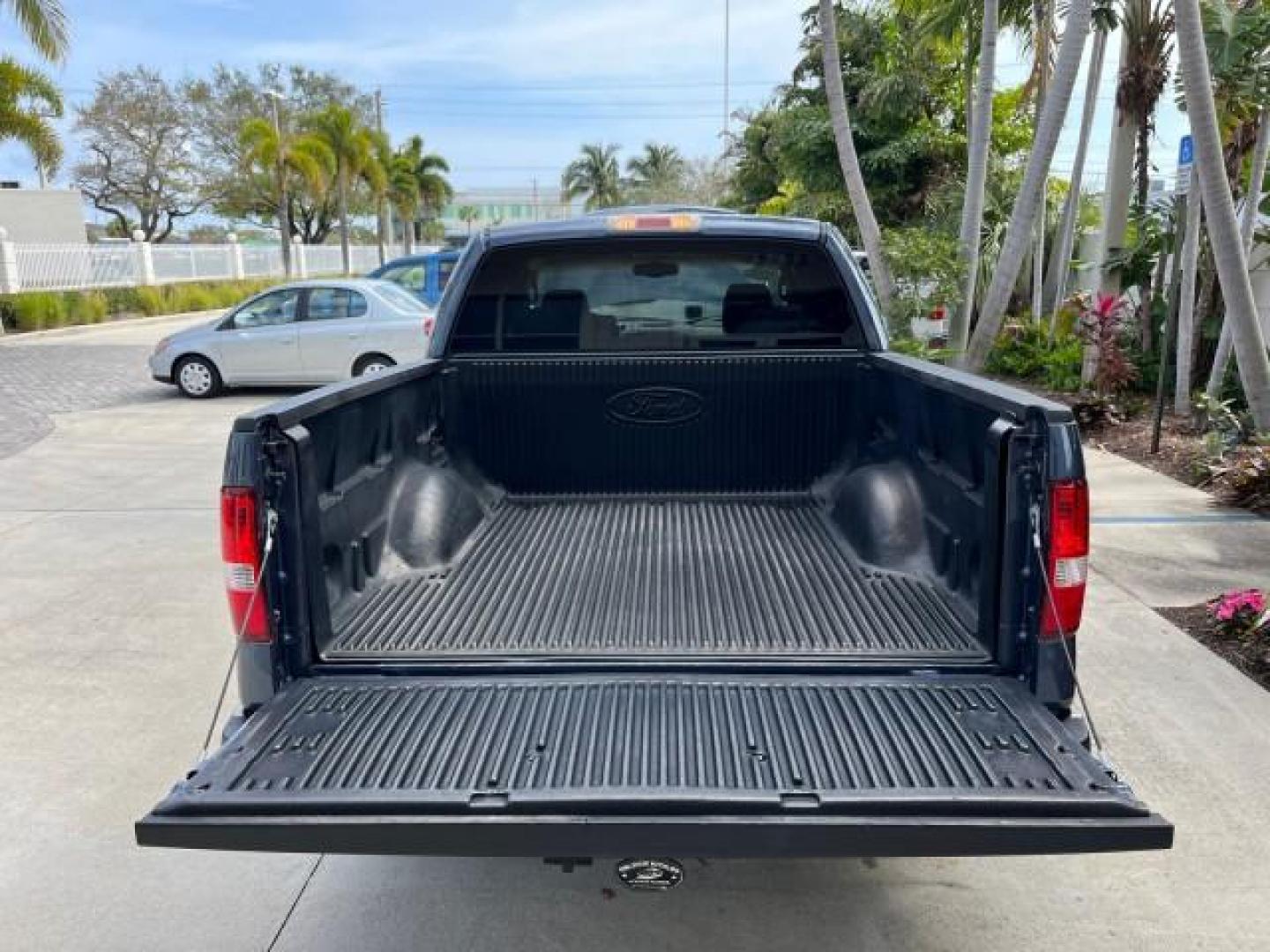 2005 Med Wedgewood Blue Metallic /Tan Ford F-150 Lariat 4 DR LOW MILES 66,727 (1FTPW12515F) with an 5.4L 3v EFI V8 Engine engine, Automatic transmission, located at 4701 North Dixie Hwy, Pompano Beach, FL, 33064, (954) 422-2889, 26.240938, -80.123474 - 2005 FORD F-150 XLT LARIAT LEATHER ROAD READY 5.4L V8 VIN: 1FTPW12515FA13968 NO ACCIDENTS CREW PICKUP NO RECALLS 5,6 FT BED 5.4L V8 F SOHC 1 OWNER LOW MILES 66,727 GASOLINE POWER LEATHER SEATS REAR WHEEL DRIVE 18 SERVICE RECORDS 5.6' Bed Length Alloy Wheels Automatic Climate Control Cruise Control R - Photo#63