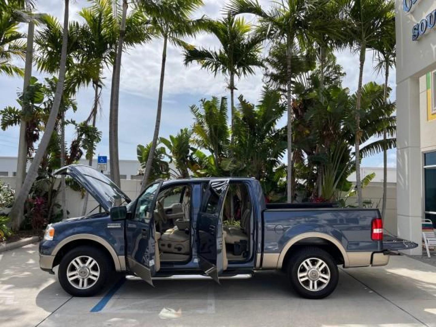 2005 Med Wedgewood Blue Metallic /Tan Ford F-150 Lariat 4 DR LOW MILES 66,727 (1FTPW12515F) with an 5.4L 3v EFI V8 Engine engine, Automatic transmission, located at 4701 North Dixie Hwy, Pompano Beach, FL, 33064, (954) 422-2889, 26.240938, -80.123474 - 2005 FORD F-150 XLT LARIAT LEATHER ROAD READY 5.4L V8 VIN: 1FTPW12515FA13968 NO ACCIDENTS CREW PICKUP NO RECALLS 5,6 FT BED 5.4L V8 F SOHC 1 OWNER LOW MILES 66,727 GASOLINE POWER LEATHER SEATS REAR WHEEL DRIVE 18 SERVICE RECORDS 5.6' Bed Length Alloy Wheels Automatic Climate Control Cruise Control R - Photo#8