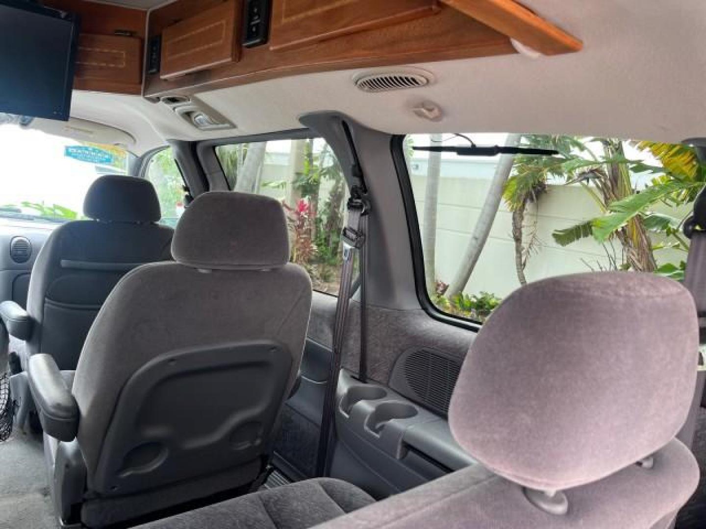 2000 Bright White /Mist Gray Dodge Caravan HI TOP CONVERSION LOW MILES 88,757 (1B4GP44R9YB) with an 3.3L SMPI V6 Engine engine, Automatic transmission, located at 4701 North Dixie Hwy, Pompano Beach, FL, 33064, (954) 422-2889, 26.240938, -80.123474 - OUR WEBPAGE FLORIDACARS1.COM HAS OVER 100 PHOTOS AND FREE CARFAX LINK 2000 DODGE GRAND CARAVAN SE ROAD READY 3.3L V6 VIN: 1B4GP44R9YB711977 NO RECALLS TV VAN LOW MILES 88,757 3.3L V6 F OHV 12V 44 SERVICE RECORDS GASOLINE 3 ROW SEATS BLUETOOTH FRONT WHEEL DRIVE POWER SEATS/MIRRORS Cruise Control FWD - Photo#73