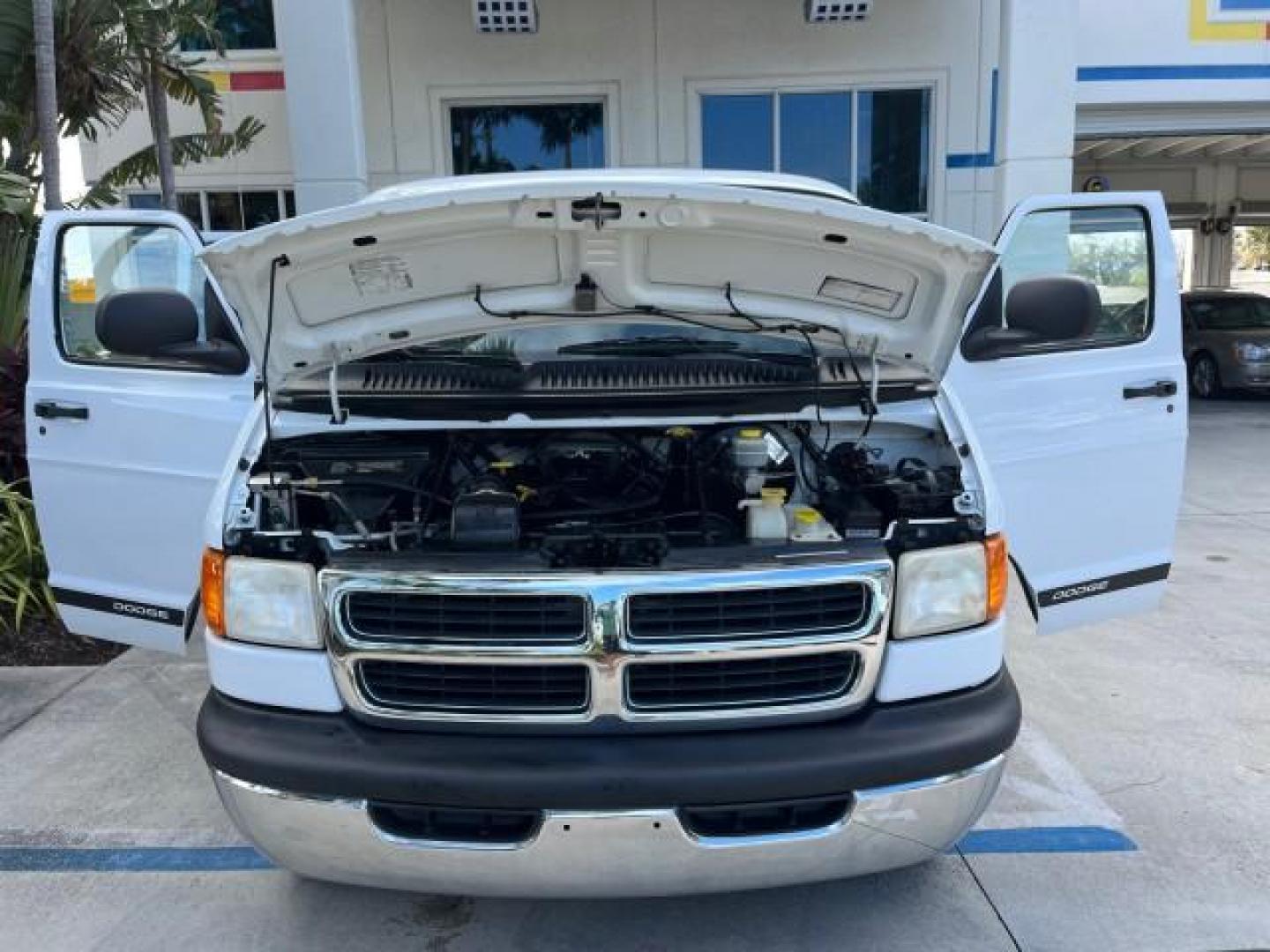 2001 Bright White /Dark Slate Gray Dodge Ram Wagon 3500 15 PASS LOW MILES 70,056 (2B5WB35Z81K) with an 5.9L SMPI V8 Magnum Engine engine, Automatic transmission, located at 4701 North Dixie Hwy, Pompano Beach, FL, 33064, (954) 422-2889, 26.240938, -80.123474 - 2001 DODGE RAM VAN 3500 MAXI EXT ROAD READY 5,9L V8 VIN: 2B5WB35Z81K531405 LOW MILES 70,056 VAN 15 PASSANGER 5.9L V8 F OHV 16V 4 ROW SEATS GASOLINE 5 SERVICE RECORDS REAR WHEEL DRIVE POWER MIRRORS Approach Lights Front Bucket Seats RWD THIS IS ONE OF THE NICEST DODGE RAMS WE HAVE EVER LISTED RETIREE - Photo#18