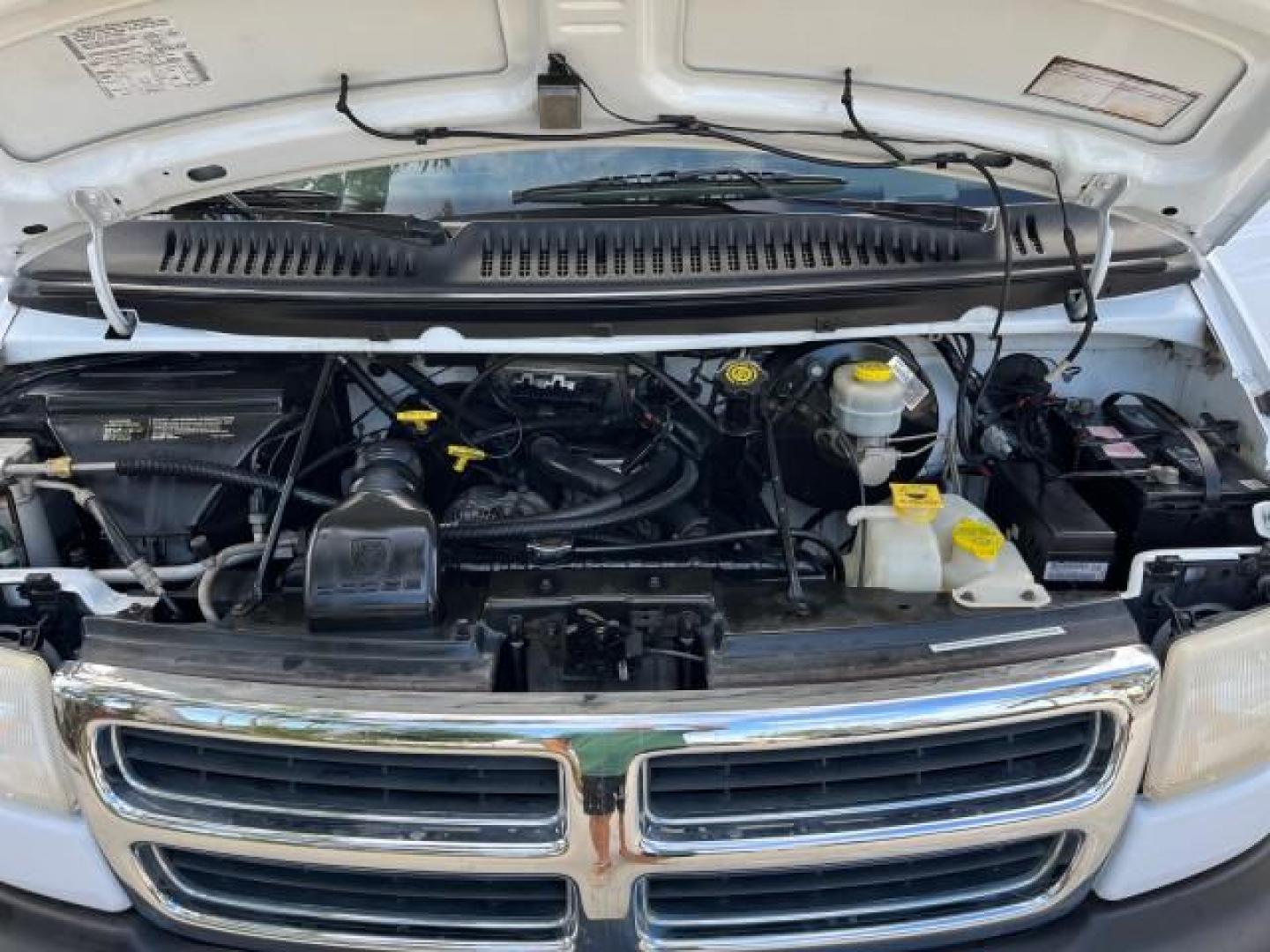 2001 Bright White /Dark Slate Gray Dodge Ram Wagon 3500 15 PASS LOW MILES 70,056 (2B5WB35Z81K) with an 5.9L SMPI V8 Magnum Engine engine, Automatic transmission, located at 4701 North Dixie Hwy, Pompano Beach, FL, 33064, (954) 422-2889, 26.240938, -80.123474 - 2001 DODGE RAM VAN 3500 MAXI EXT ROAD READY 5,9L V8 VIN: 2B5WB35Z81K531405 LOW MILES 70,056 VAN 15 PASSANGER 5.9L V8 F OHV 16V 4 ROW SEATS GASOLINE 5 SERVICE RECORDS REAR WHEEL DRIVE POWER MIRRORS Approach Lights Front Bucket Seats RWD THIS IS ONE OF THE NICEST DODGE RAMS WE HAVE EVER LISTED RETIREE - Photo#19