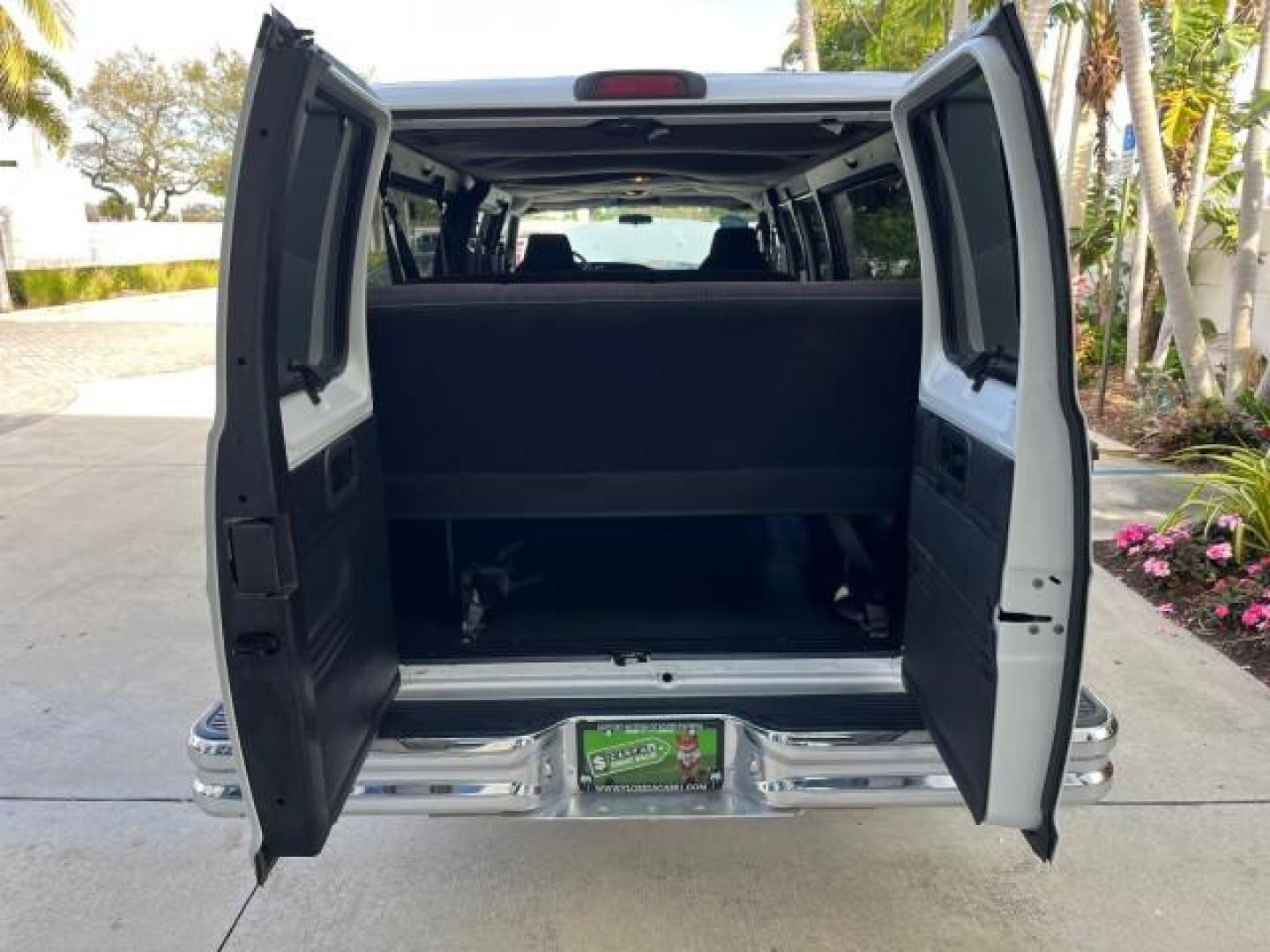 2001 Bright White /Dark Slate Gray Dodge Ram Wagon 3500 15 PASS LOW MILES 70,056 (2B5WB35Z81K) with an 5.9L SMPI V8 Magnum Engine engine, Automatic transmission, located at 4701 North Dixie Hwy, Pompano Beach, FL, 33064, (954) 422-2889, 26.240938, -80.123474 - 2001 DODGE RAM VAN 3500 MAXI EXT ROAD READY 5,9L V8 VIN: 2B5WB35Z81K531405 LOW MILES 70,056 VAN 15 PASSANGER 5.9L V8 F OHV 16V 4 ROW SEATS GASOLINE 5 SERVICE RECORDS REAR WHEEL DRIVE POWER MIRRORS Approach Lights Front Bucket Seats RWD THIS IS ONE OF THE NICEST DODGE RAMS WE HAVE EVER LISTED RETIREE - Photo#52