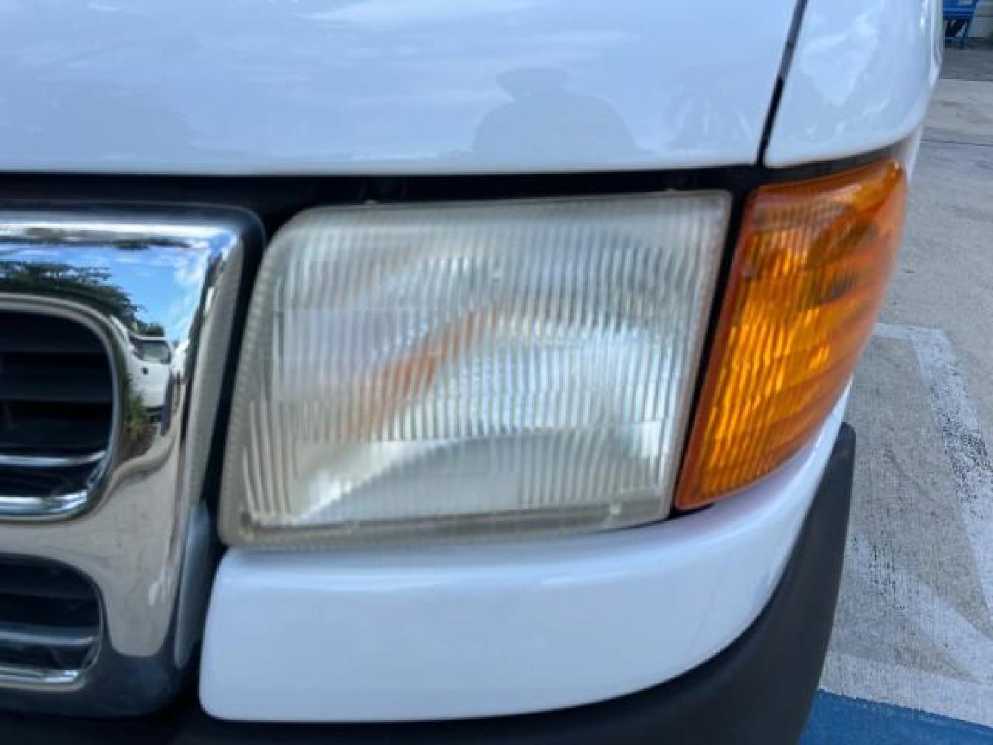 2001 Bright White /Dark Slate Gray Dodge Ram Wagon 3500 15 PASS LOW MILES 70,056 (2B5WB35Z81K) with an 5.9L SMPI V8 Magnum Engine engine, Automatic transmission, located at 4701 North Dixie Hwy, Pompano Beach, FL, 33064, (954) 422-2889, 26.240938, -80.123474 - 2001 DODGE RAM VAN 3500 MAXI EXT ROAD READY 5,9L V8 VIN: 2B5WB35Z81K531405 LOW MILES 70,056 VAN 15 PASSANGER 5.9L V8 F OHV 16V 4 ROW SEATS GASOLINE 5 SERVICE RECORDS REAR WHEEL DRIVE POWER MIRRORS Approach Lights Front Bucket Seats RWD THIS IS ONE OF THE NICEST DODGE RAMS WE HAVE EVER LISTED RETIREE - Photo#55