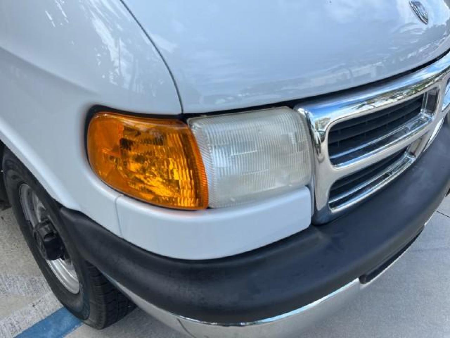 2001 Bright White /Dark Slate Gray Dodge Ram Wagon 3500 15 PASS LOW MILES 70,056 (2B5WB35Z81K) with an 5.9L SMPI V8 Magnum Engine engine, Automatic transmission, located at 4701 North Dixie Hwy, Pompano Beach, FL, 33064, (954) 422-2889, 26.240938, -80.123474 - 2001 DODGE RAM VAN 3500 MAXI EXT ROAD READY 5,9L V8 VIN: 2B5WB35Z81K531405 LOW MILES 70,056 VAN 15 PASSANGER 5.9L V8 F OHV 16V 4 ROW SEATS GASOLINE 5 SERVICE RECORDS REAR WHEEL DRIVE POWER MIRRORS Approach Lights Front Bucket Seats RWD THIS IS ONE OF THE NICEST DODGE RAMS WE HAVE EVER LISTED RETIREE - Photo#59