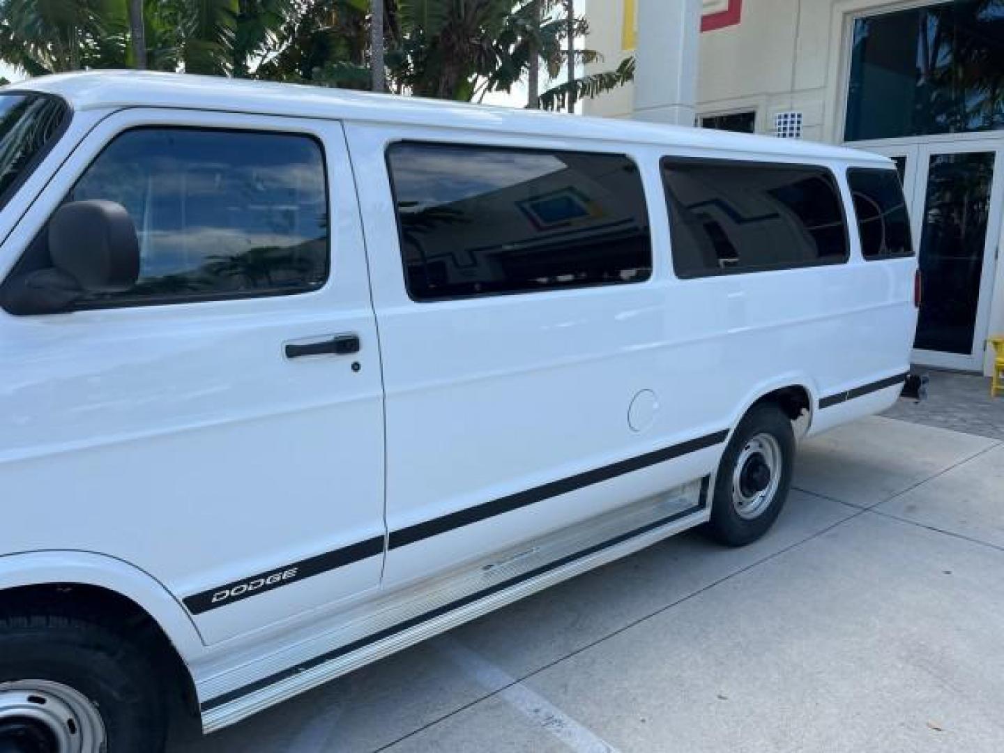 2001 Bright White /Dark Slate Gray Dodge Ram Wagon 3500 15 PASS LOW MILES 70,056 (2B5WB35Z81K) with an 5.9L SMPI V8 Magnum Engine engine, Automatic transmission, located at 4701 North Dixie Hwy, Pompano Beach, FL, 33064, (954) 422-2889, 26.240938, -80.123474 - 2001 DODGE RAM VAN 3500 MAXI EXT ROAD READY 5,9L V8 VIN: 2B5WB35Z81K531405 LOW MILES 70,056 VAN 15 PASSANGER 5.9L V8 F OHV 16V 4 ROW SEATS GASOLINE 5 SERVICE RECORDS REAR WHEEL DRIVE POWER MIRRORS Approach Lights Front Bucket Seats RWD THIS IS ONE OF THE NICEST DODGE RAMS WE HAVE EVER LISTED RETIREE - Photo#62