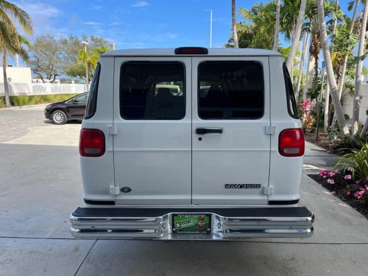 2001 Bright White /Dark Slate Gray Dodge Ram Wagon 3500 15 PASS LOW MILES 70,056 (2B5WB35Z81K) with an 5.9L SMPI V8 Magnum Engine engine, Automatic transmission, located at 4701 North Dixie Hwy, Pompano Beach, FL, 33064, (954) 422-2889, 26.240938, -80.123474 - 2001 DODGE RAM VAN 3500 MAXI EXT ROAD READY 5,9L V8 VIN: 2B5WB35Z81K531405 LOW MILES 70,056 VAN 15 PASSANGER 5.9L V8 F OHV 16V 4 ROW SEATS GASOLINE 5 SERVICE RECORDS REAR WHEEL DRIVE POWER MIRRORS Approach Lights Front Bucket Seats RWD THIS IS ONE OF THE NICEST DODGE RAMS WE HAVE EVER LISTED RETIREE - Photo#6