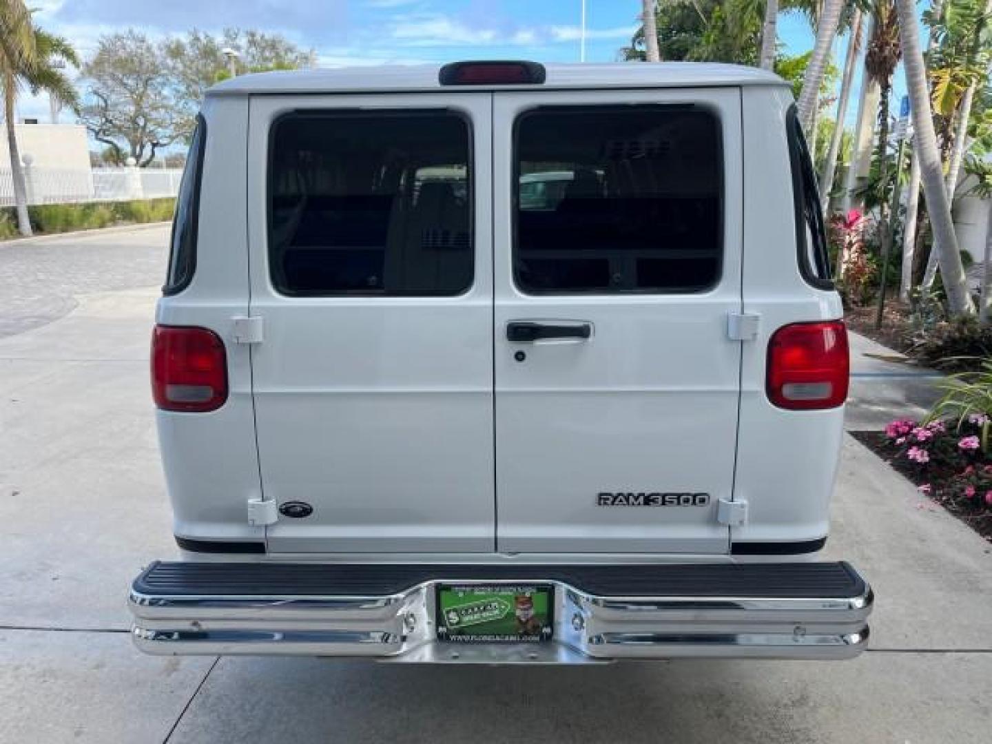 2001 Bright White /Dark Slate Gray Dodge Ram Wagon 3500 15 PASS LOW MILES 70,056 (2B5WB35Z81K) with an 5.9L SMPI V8 Magnum Engine engine, Automatic transmission, located at 4701 North Dixie Hwy, Pompano Beach, FL, 33064, (954) 422-2889, 26.240938, -80.123474 - 2001 DODGE RAM VAN 3500 MAXI EXT ROAD READY 5,9L V8 VIN: 2B5WB35Z81K531405 LOW MILES 70,056 VAN 15 PASSANGER 5.9L V8 F OHV 16V 4 ROW SEATS GASOLINE 5 SERVICE RECORDS REAR WHEEL DRIVE POWER MIRRORS Approach Lights Front Bucket Seats RWD THIS IS ONE OF THE NICEST DODGE RAMS WE HAVE EVER LISTED RETIREE - Photo#71