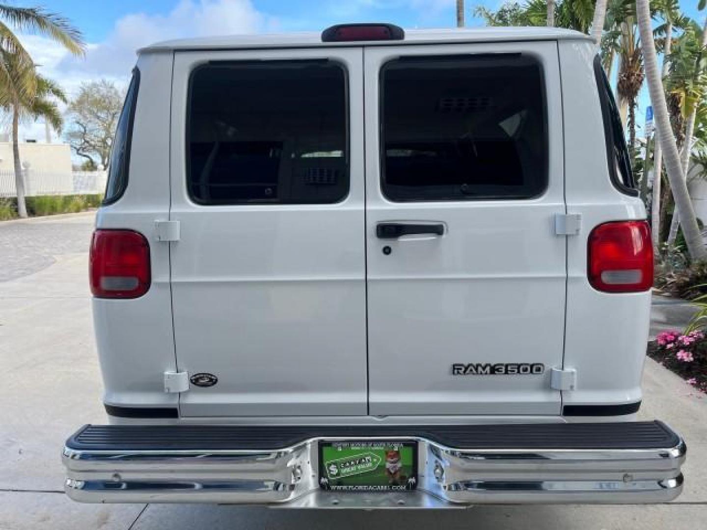 2001 Bright White /Dark Slate Gray Dodge Ram Wagon 3500 15 PASS LOW MILES 70,056 (2B5WB35Z81K) with an 5.9L SMPI V8 Magnum Engine engine, Automatic transmission, located at 4701 North Dixie Hwy, Pompano Beach, FL, 33064, (954) 422-2889, 26.240938, -80.123474 - 2001 DODGE RAM VAN 3500 MAXI EXT ROAD READY 5,9L V8 VIN: 2B5WB35Z81K531405 LOW MILES 70,056 VAN 15 PASSANGER 5.9L V8 F OHV 16V 4 ROW SEATS GASOLINE 5 SERVICE RECORDS REAR WHEEL DRIVE POWER MIRRORS Approach Lights Front Bucket Seats RWD THIS IS ONE OF THE NICEST DODGE RAMS WE HAVE EVER LISTED RETIREE - Photo#75