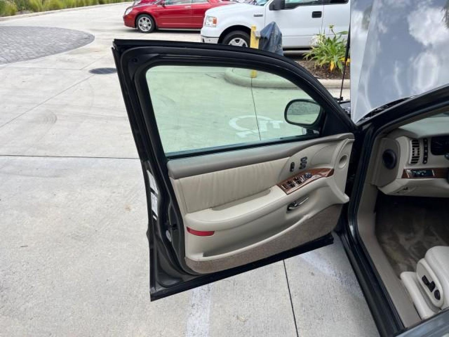 2002 Granite /Medium Gray Buick Park Avenue LOW MILES 67,143 (1G4CW54K224) with an 3.8L SFI V6 3800 Series II Engine engine, Automatic transmission, located at 4701 North Dixie Hwy, Pompano Beach, FL, 33064, (954) 422-2889, 26.240938, -80.123474 - 2002 BUICK PARK AVENUE NEW $37,242 ROAD READY VIN: 1G4CW54K224145097 NO ACCIDENTS 3.8L V6 SEDAN 4 DR NO RECALLS 29 MPG 3.8L V6 F 12V POWER LEATHER SEATS GASOLINE 29 MPG POWER MIRRORS LOW MILES 67,142 FRONT WHEEL DRIVE DUAL ZONE AC 5 SERVICE RECORDS Air Suspension Alloy Wheels Anti-Theft System Appro - Photo#9