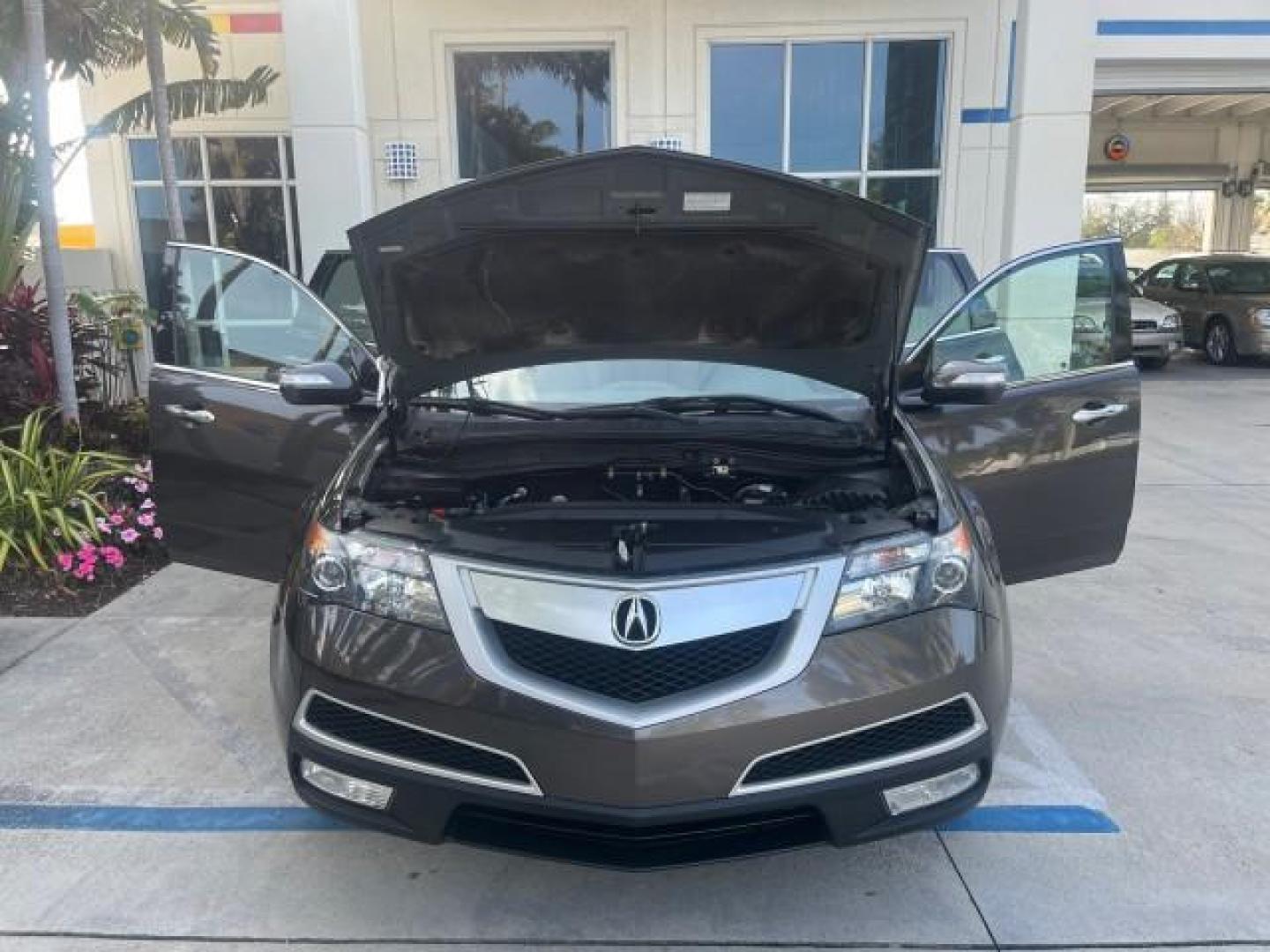 2010 Mocha Metallic /Ebony Acura MDX 1 FL LOW MILES 37,478 AWD (2HNYD2H20AH) with an 3.7L PGM-FI MPI SOHC 24-Valve VTEC V6 Engine engine, Automatic transmission, located at 4701 North Dixie Hwy, Pompano Beach, FL, 33064, (954) 422-2889, 26.240938, -80.123474 - 2010 ACURA MDX SH-AWD NEW $42,430 ROAD READY VIN: 2HNYD2H20AH509084 NO RECALLS 3.7L V6 AWD 4 DOOR WAGON/SPORT UTILITY LEATHER 3 ROW SEATS 3.7L V6 F SOHC 24V SUNROOF 1 OWNER FLORIDA GASOLINE DUAL ZONE AC LOW MILES 37,452 ALL WHEEL DRIVE BLUETOOTH BACK UP CAMERA AWD Active Head Restraints Adjustable L - Photo#16