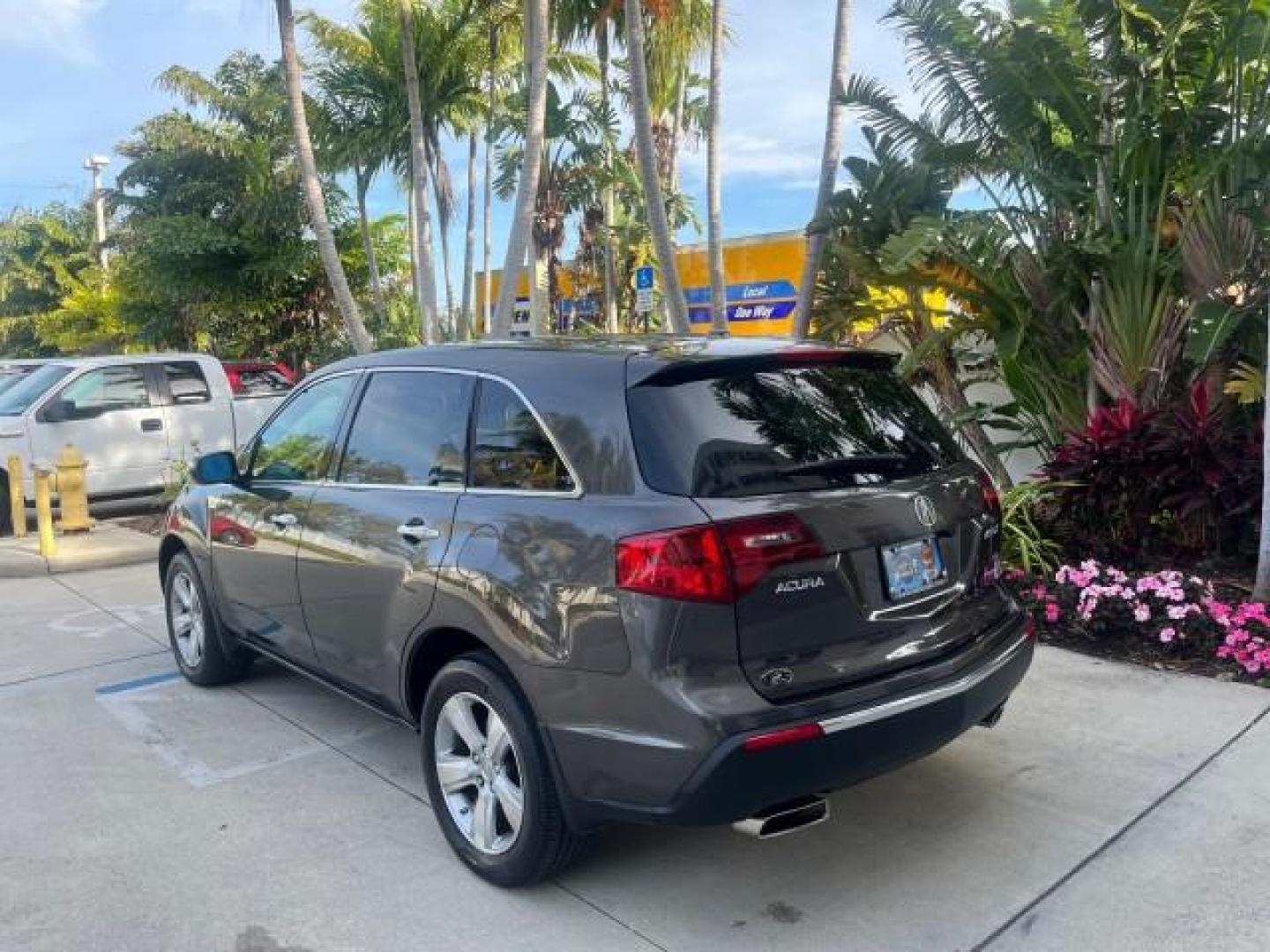 2010 Mocha Metallic /Ebony Acura MDX 1 FL LOW MILES 37,478 AWD (2HNYD2H20AH) with an 3.7L PGM-FI MPI SOHC 24-Valve VTEC V6 Engine engine, Automatic transmission, located at 4701 North Dixie Hwy, Pompano Beach, FL, 33064, (954) 422-2889, 26.240938, -80.123474 - 2010 ACURA MDX SH-AWD NEW $42,430 ROAD READY VIN: 2HNYD2H20AH509084 NO RECALLS 3.7L V6 AWD 4 DOOR WAGON/SPORT UTILITY LEATHER 3 ROW SEATS 3.7L V6 F SOHC 24V SUNROOF 1 OWNER FLORIDA GASOLINE DUAL ZONE AC LOW MILES 37,452 ALL WHEEL DRIVE BLUETOOTH BACK UP CAMERA AWD Active Head Restraints Adjustable L - Photo#5