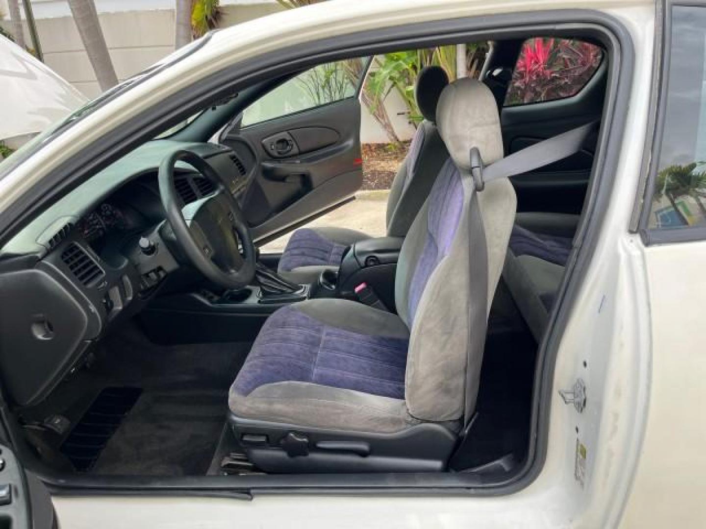 2005 White /Medium Gray Chevrolet Monte Carlo LS LOW MILES 96,037 (2G1WW12E759) with an 3.4L 3400 V6 SFI Engine engine, Automatic transmission, located at 4701 North Dixie Hwy, Pompano Beach, FL, 33064, (954) 422-2889, 26.240938, -80.123474 - 2005 CHEVROLET MONTE CARLO LS ROAD READY 3,4L V6 VIN: 2G1WW12E759204646 NO ACCIDENTS 32 MPG COUPE NO RECALLS DUAL ZONE AC 3.4L V6 F FLORIDA OWNER GASOLINE POWER MIRRORS LOW MILES 90,037 FRONT WHEEL DRIVE POWER SEATS 15 SERVICE RECORDS Alloy Wheels Automatic Climate Control Cruise Control Dual-Zone C - Photo#10