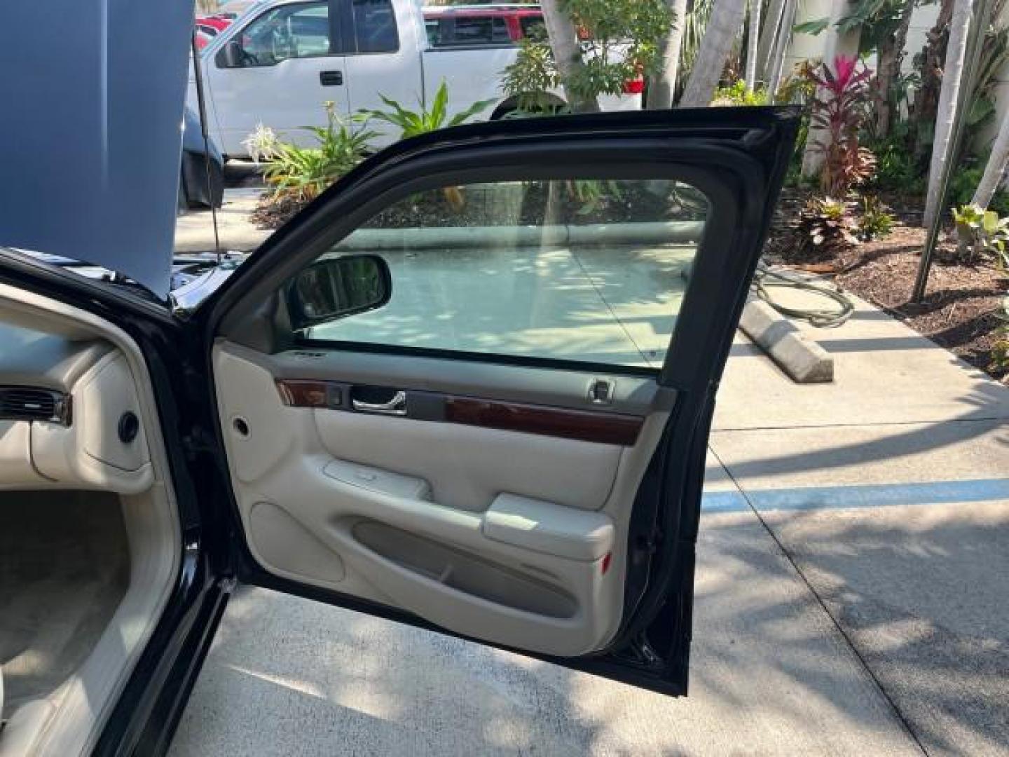 2001 Sable Black /Oatmeal Cadillac Seville Touring STS LOW MILES 50,141 (1G6KY54951U) with an 4.6L SFI DOHC V8 300hp Northstar Engine engine, Automatic transmission, located at 4701 North Dixie Hwy, Pompano Beach, FL, 33064, (954) 422-2889, 26.240938, -80.123474 - 2001 CADILLAC SEVILLE STS NEW $53,205 ROAD READY VIN: 1G6KY54951U137293 NO ACCIDENTS NO RECALLS SEDAN 4 DR HEATED SEATS/MIRRORS FLORIDA OWNER 28 MPG 4.6L V8 F DOHC 32V BACK UP SENSORS 13 SERVICE RECORDS 4.6L V8 GASOLINE POWER MIRRORS POWER LEATHER SEATS FRONT WHEEL DRIVE LOW MILES 50,141 DUAL ZONE A - Photo#11