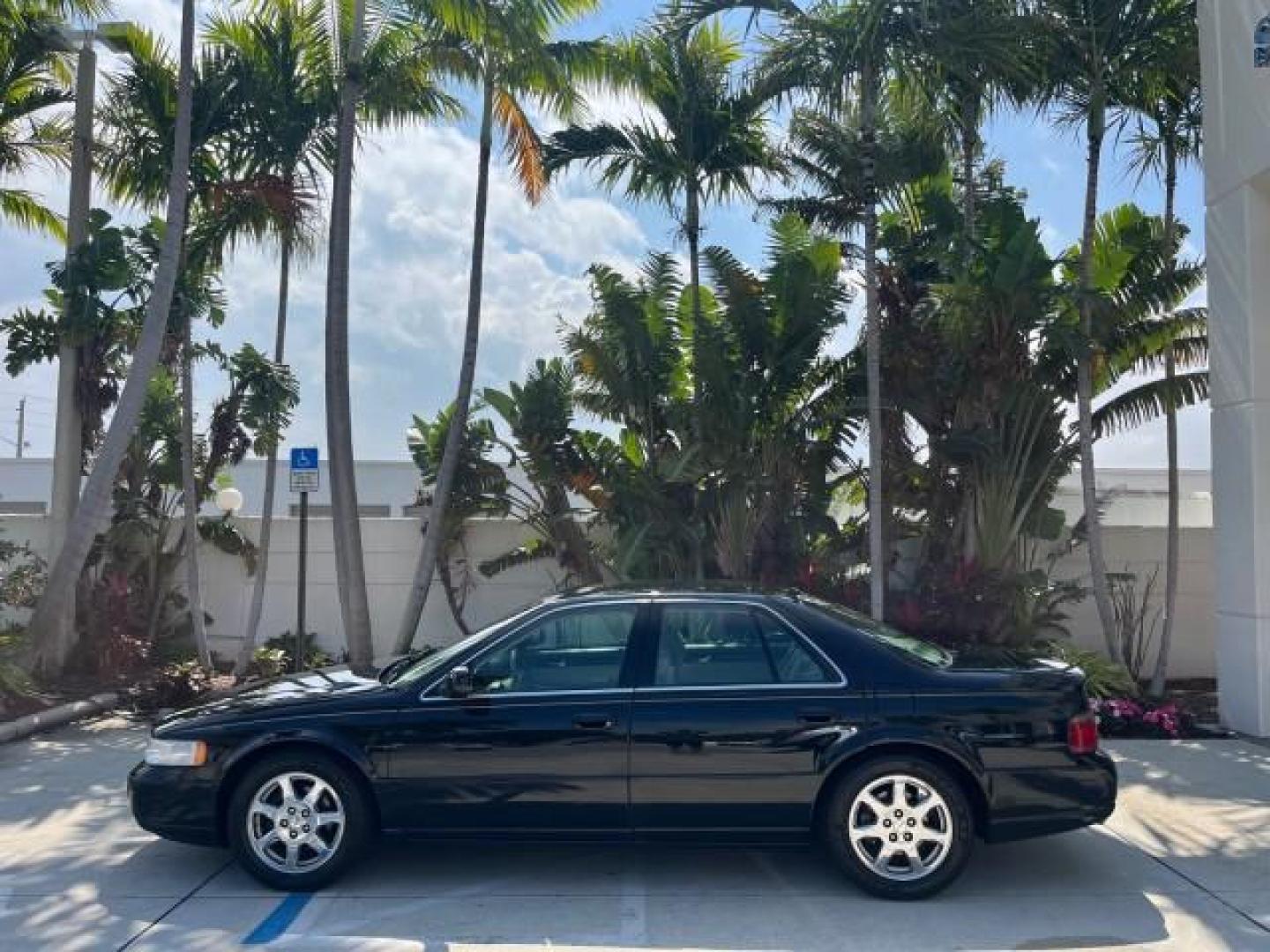 2001 Sable Black /Oatmeal Cadillac Seville Touring STS LOW MILES 50,141 (1G6KY54951U) with an 4.6L SFI DOHC V8 300hp Northstar Engine engine, Automatic transmission, located at 4701 North Dixie Hwy, Pompano Beach, FL, 33064, (954) 422-2889, 26.240938, -80.123474 - 2001 CADILLAC SEVILLE STS NEW $53,205 ROAD READY VIN: 1G6KY54951U137293 NO ACCIDENTS NO RECALLS SEDAN 4 DR HEATED SEATS/MIRRORS FLORIDA OWNER 28 MPG 4.6L V8 F DOHC 32V BACK UP SENSORS 13 SERVICE RECORDS 4.6L V8 GASOLINE POWER MIRRORS POWER LEATHER SEATS FRONT WHEEL DRIVE LOW MILES 50,141 DUAL ZONE A - Photo#4