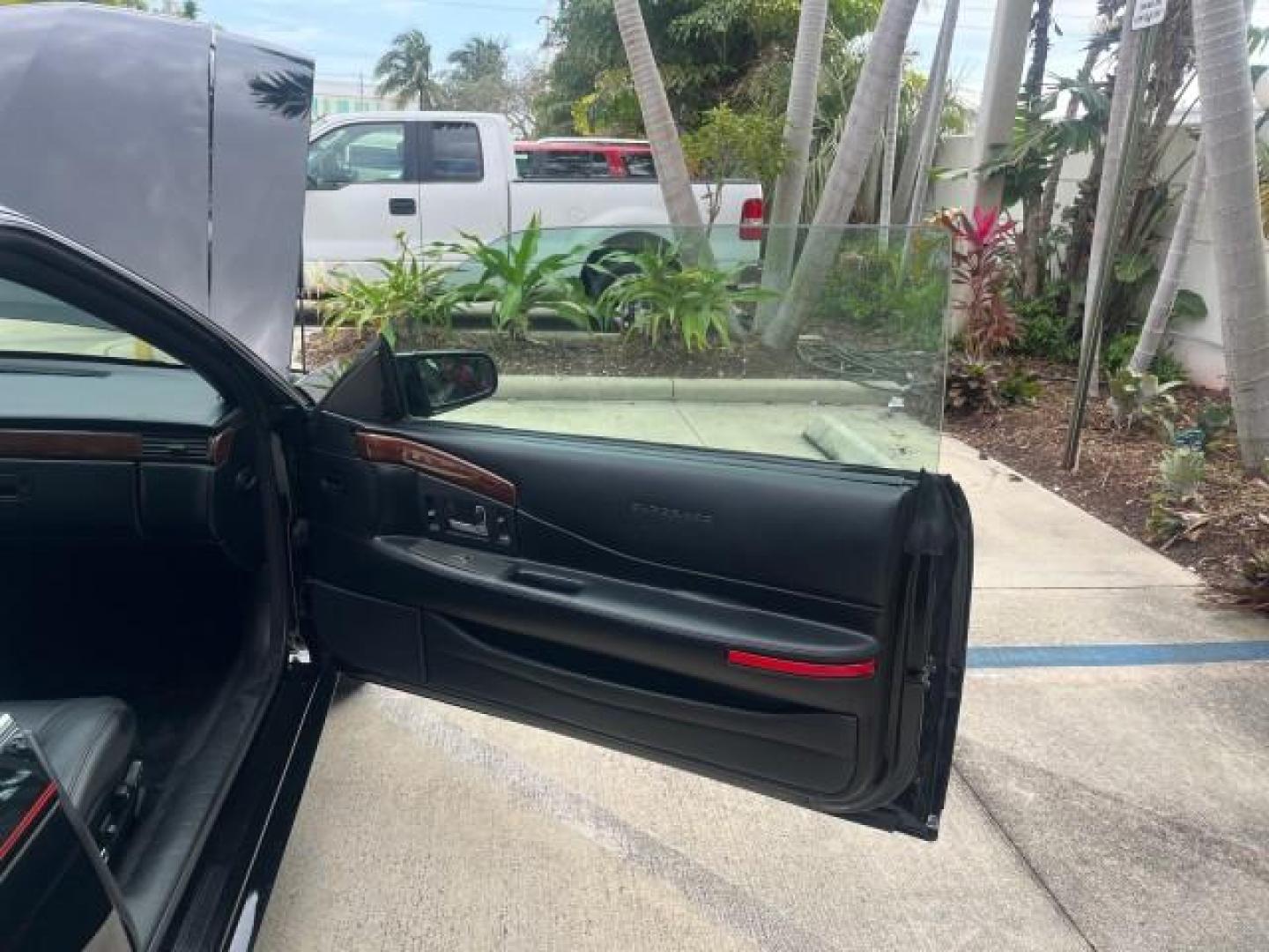 2000 Sable Black /Black Cadillac Eldorado Touring ETC LOW MILES 31,868 (1G6ET1291YU) with an 4.6L SFI DOHC V8 300hp Northstar Engine engine, Automatic transmission, located at 4701 North Dixie Hwy, Pompano Beach, FL, 33064, (954) 422-2889, 26.240938, -80.123474 - 2000 CADILLAC ELDORADO ETC NEW $43,347 ROAD READY VIN: 1G6ET1291YU131721 NO ACCIDENTS NO RECALLS COUPE 1 OWNER 4.6L V8 28 MPG 4.6L V8 F DOHC 32V POWER HEATED LEATHER SEATS GASOLINE POWER HEATED MIRRORS FRONT WHEEL DRIVE DUAL ZONE AC LOW MILES 31,868 Air Suspension Alloy Wheels Anti-Theft System Appr - Photo#11