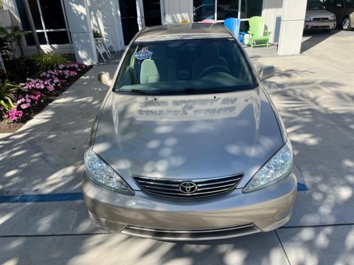 2006 Desert Sand Mica /Stone Toyota Camry LE LOW MILES 39,792 (4T1BE32KX6U) with an 2.4L DOHC SEFI 16-Valve 4-Cyl Engine engine, Automatic transmission, located at 4701 North Dixie Hwy, Pompano Beach, FL, 33064, (954) 422-2889, 26.240938, -80.123474 - 2006 TOYOTA CAMRY STANDARD ROAD READY 2.4L I4 VIN: 4T1BE32KX6U747323 NO ACCIDENTS SEDAN 4 DR NO RECALLS 2.4L I4 F DOHC 16V 1 OWNER 34 MPG GASOLINE POWER MIRRORS LOW MILES 39,792 FRONT WHEEL DRIVE POWER SEATS 6 SERVICE RECORDS Cruise Control Electronic Braking System FWD Front Bucket Seats Full Size - Photo#76