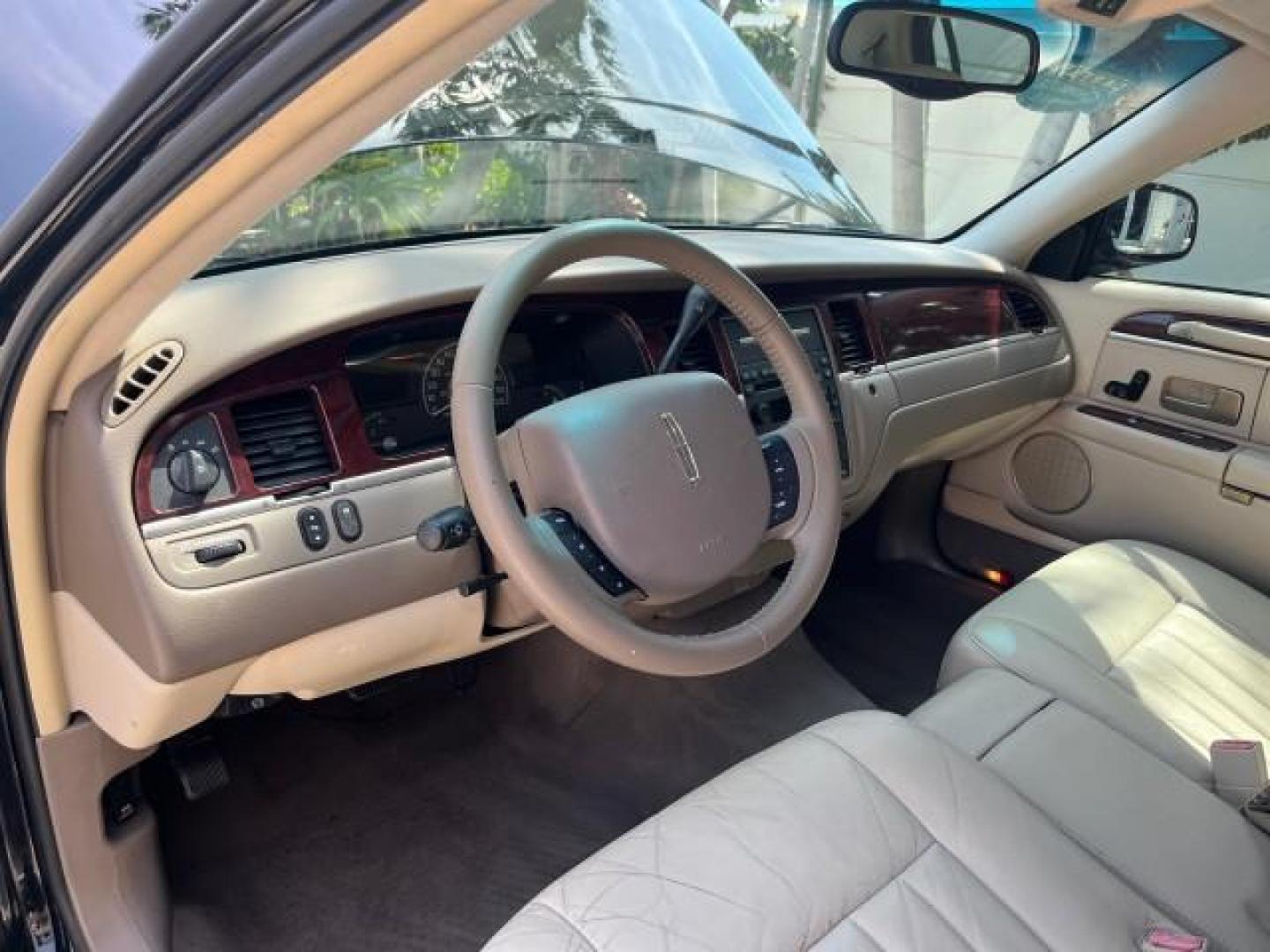 2005 Black /Dk/Med Lt Stone Lincoln Town Car Signature LOW MILES 69.333 (1LNHM81W75Y) with an 4.6L SOHC SMPI V8 Engine engine, Automatic transmission, located at 4701 North Dixie Hwy, Pompano Beach, FL, 33064, (954) 422-2889, 26.240938, -80.123474 - 2005 LINCOLN TOWN CAR SIGNATURE NEW $ 42,055 ROAD READY VIN: 1LNHM81W75Y664843 NO RECALLS 4.6L V8 SEDAN 4 DR SIGNATURE FLORIDA OWNER 4.6L V8 F OHV 16V POWER SEATS/MIRRORS LOW MILES 69,333 GASOLINE 6 SERVICE RECORDS PARKING SENSORS REAR WHEEL DRIVE DUAL ZONE AC LEATHER SEATS Alloy Wheels Anti-Theft S - Photo#38